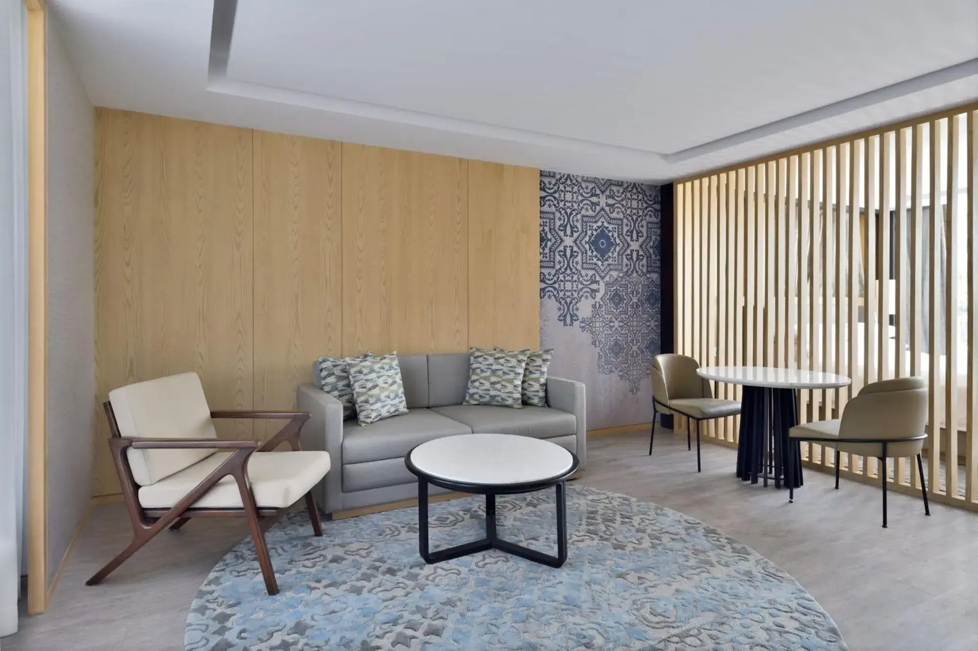 Living room, Seating Area in Courtyard by Marriott Aravali Resort