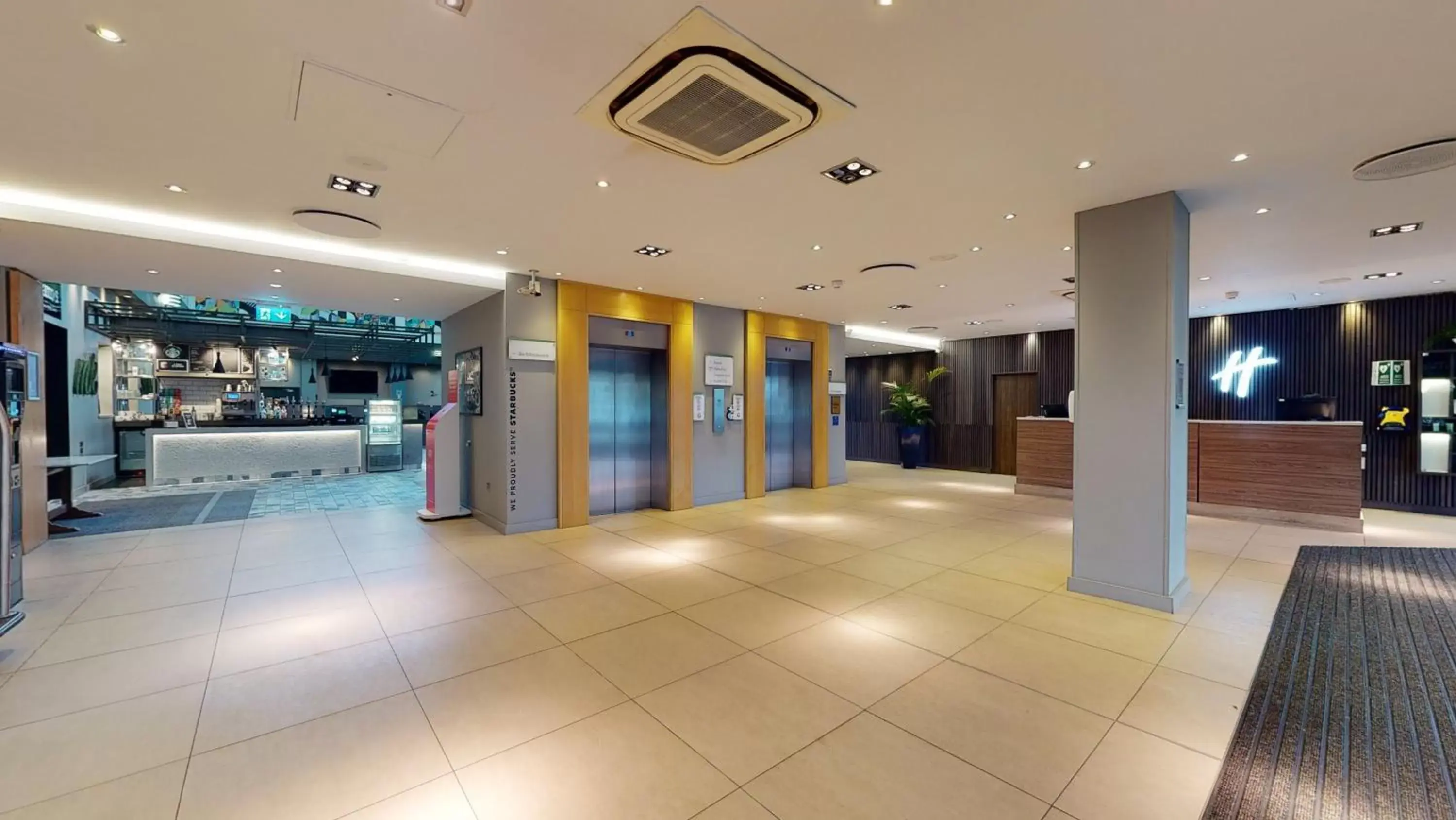 Lobby or reception in Holiday Inn Milton Keynes Central, an IHG Hotel