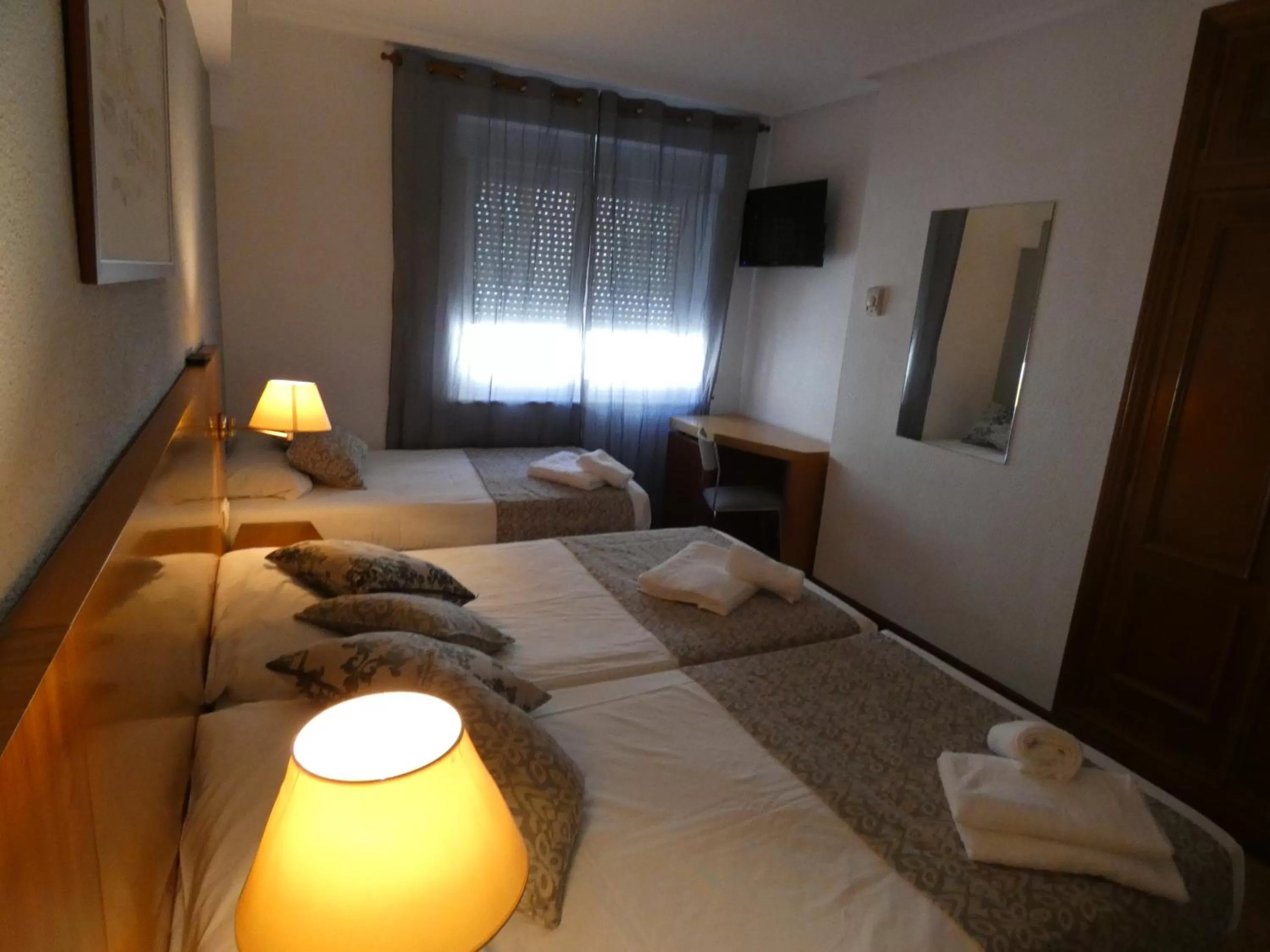 Bed in Hotel Mercado by gaiarooms