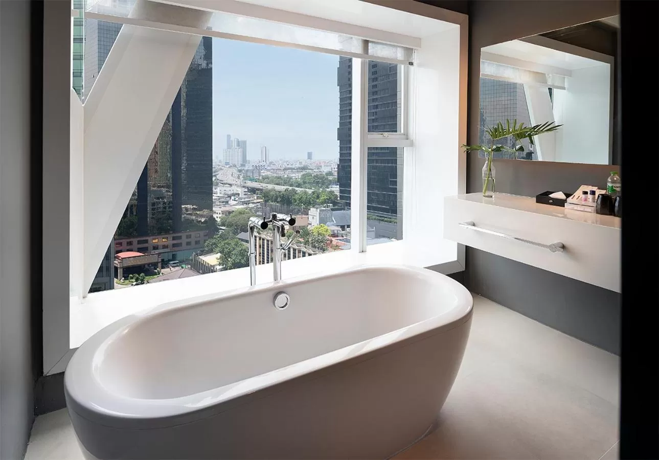 Bathroom, Bed in Mode Sathorn Hotel - SHA Extra Plus
