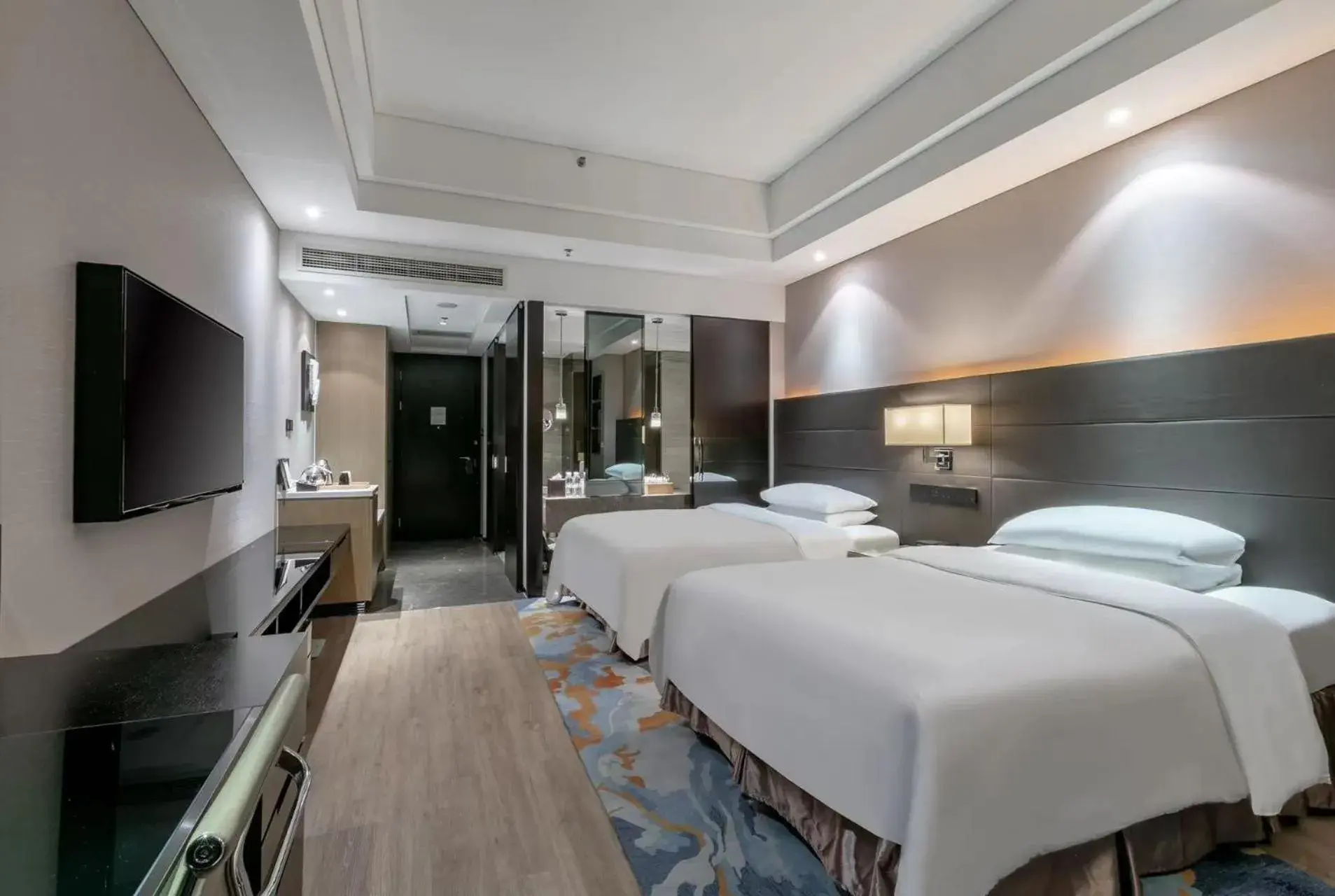Bed in Renaissance Guiyang Hotel