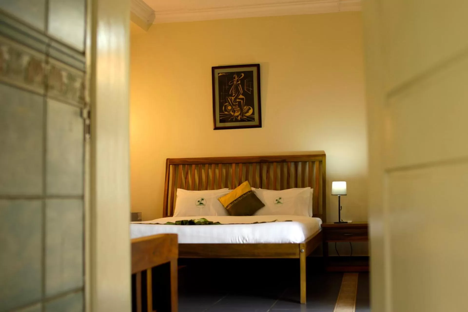 Bed in Entebbe Palm Hotel