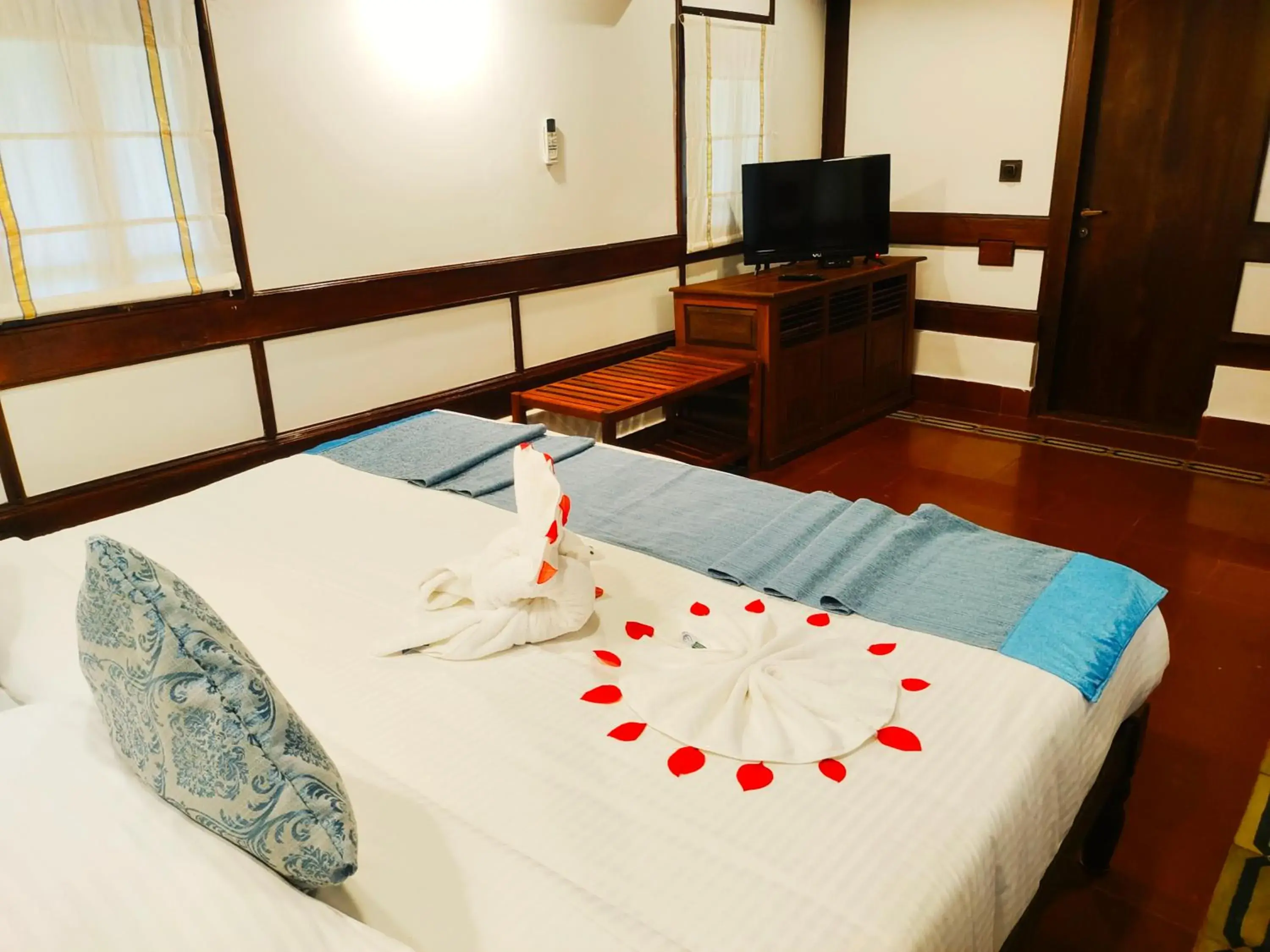 Bed in The Travancore Heritage Beach Resort