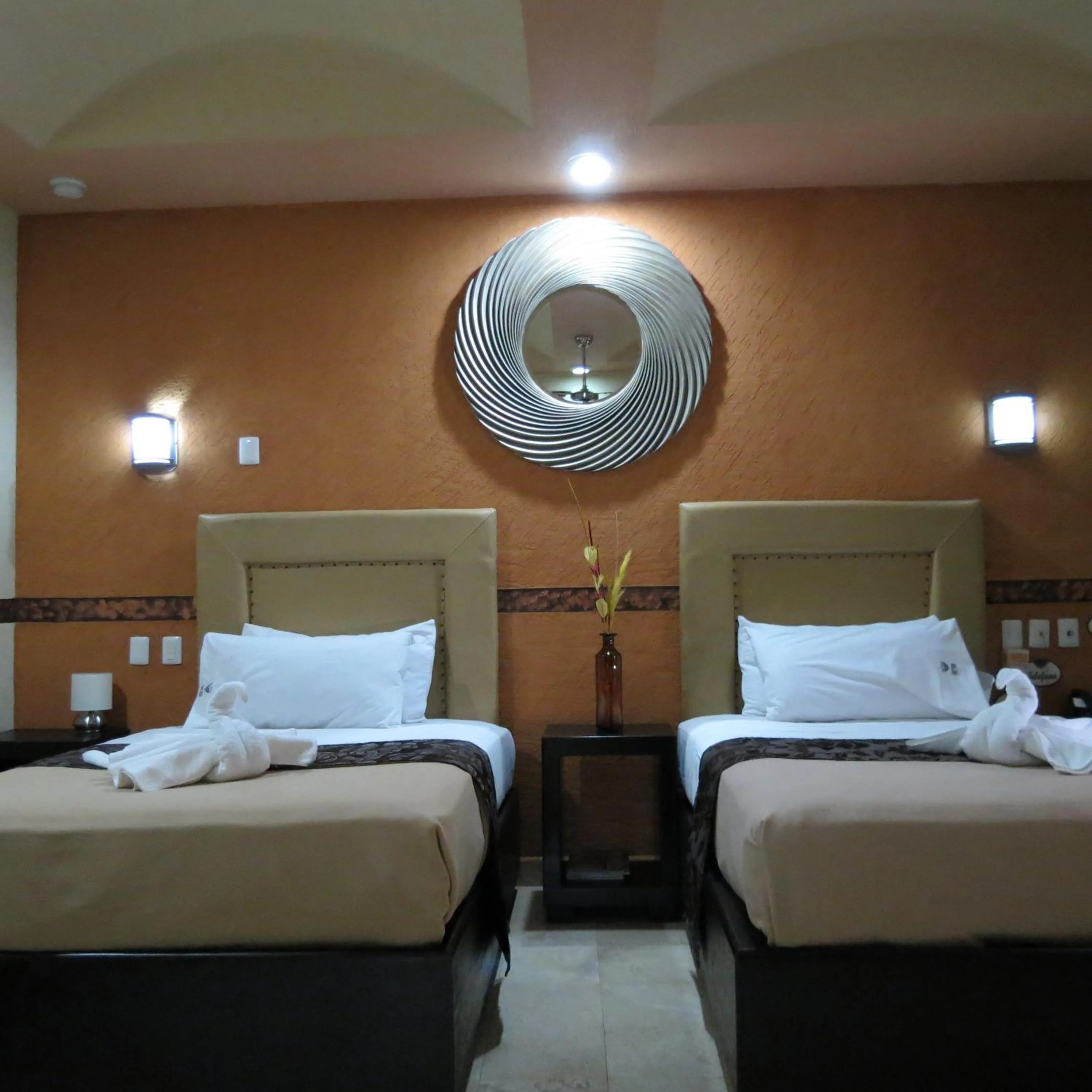 Photo of the whole room, Bed in Villas y Suites Paraiso del Sur