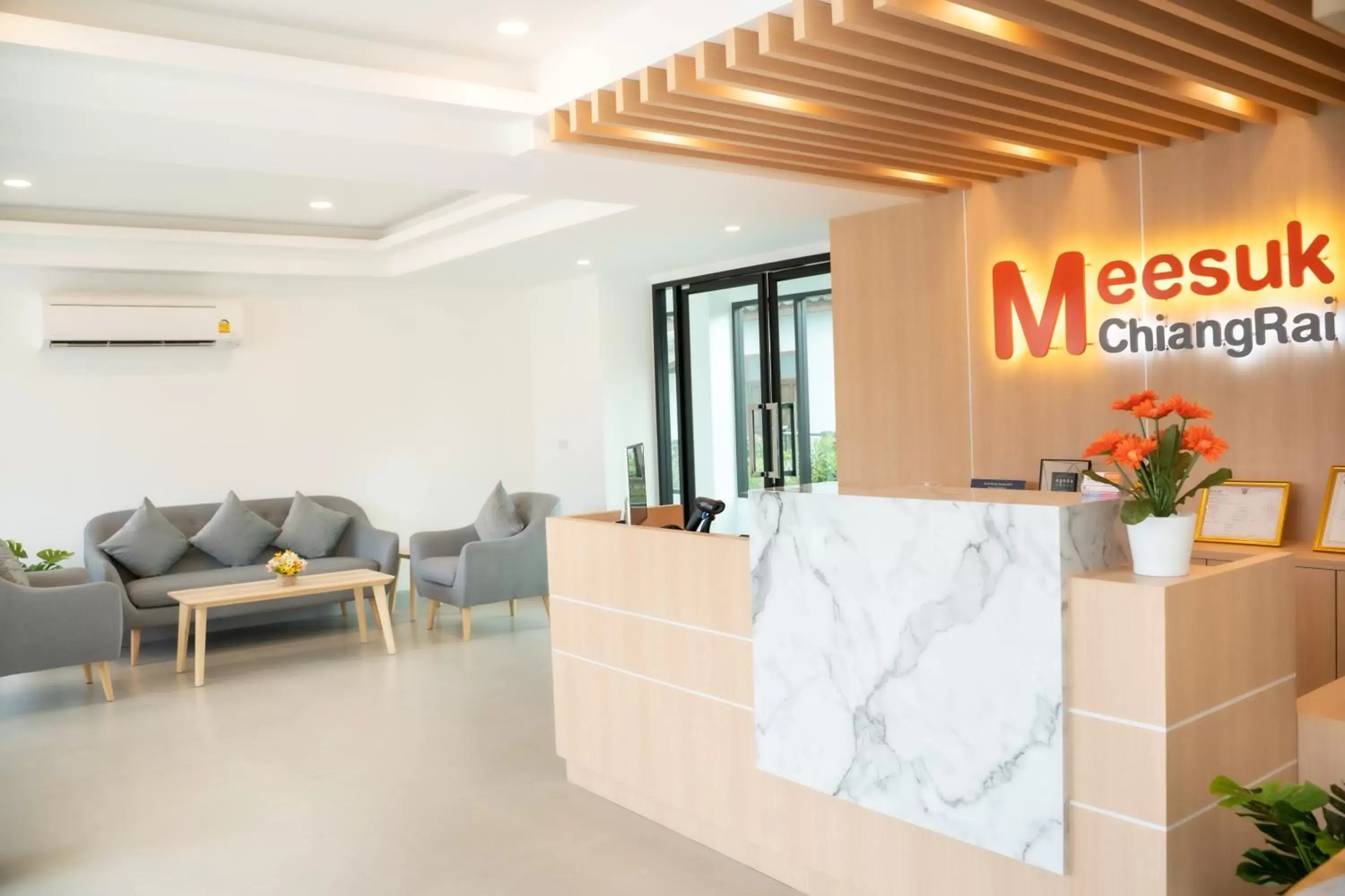 Lobby or reception in Meesuk ChiangRai Hotel, SHA Certified Lobby or reception in Meesuk ChiangRai Hotel, SHA Certified