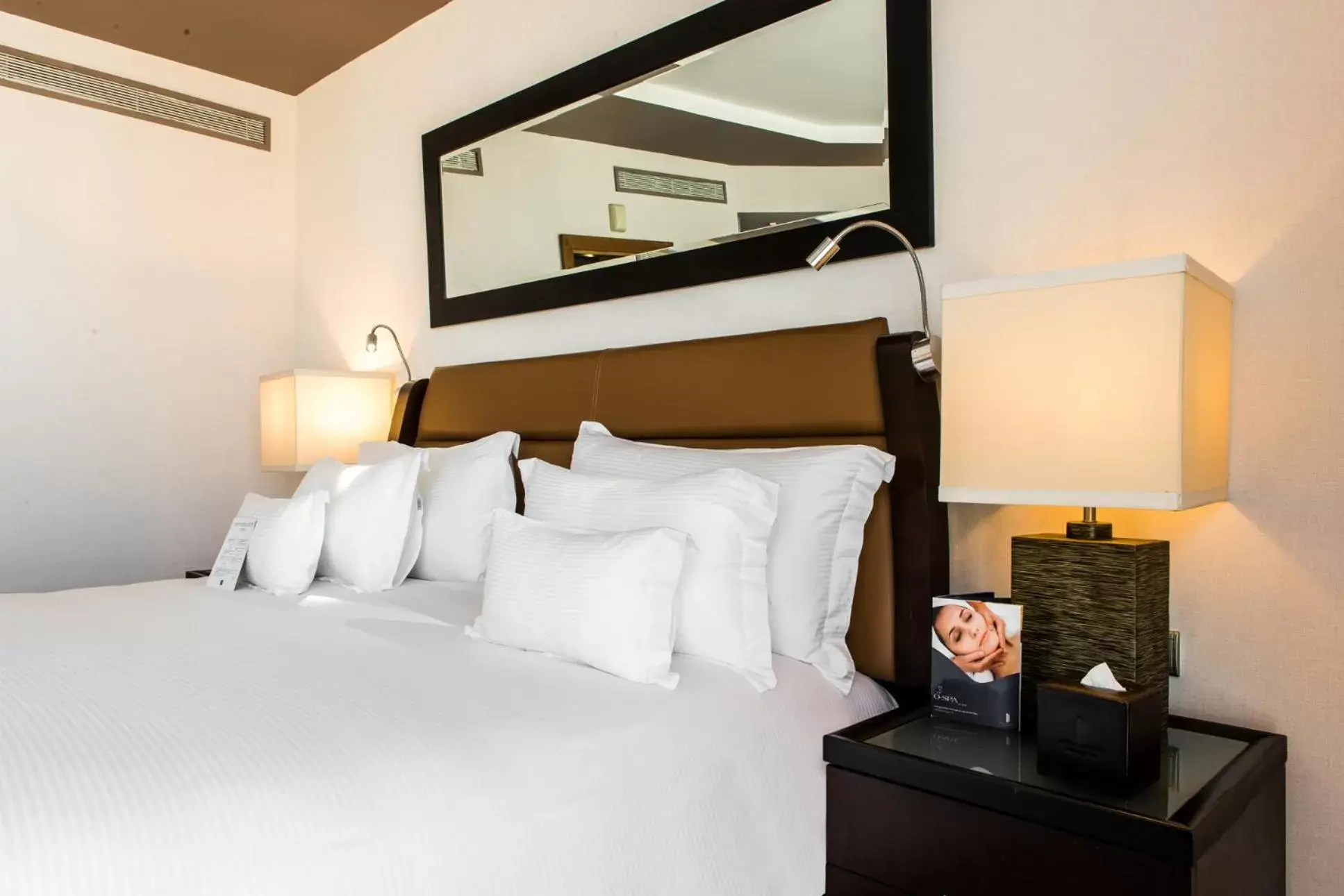 Bed in Kenzi Tower Hotel