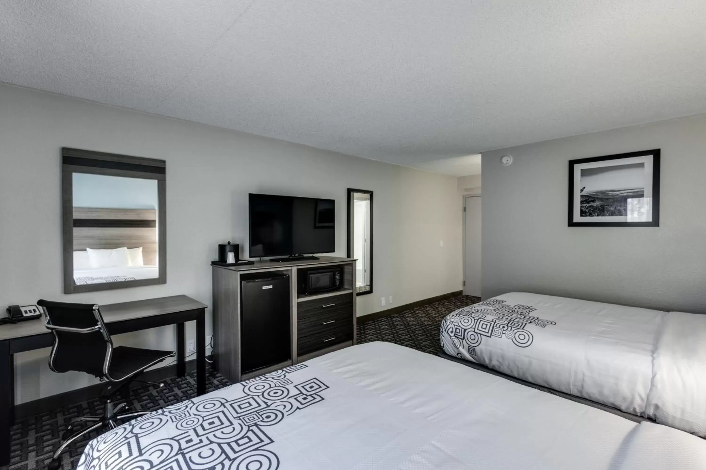 Bed in Days Inn & Suites by Wyndham Spokane