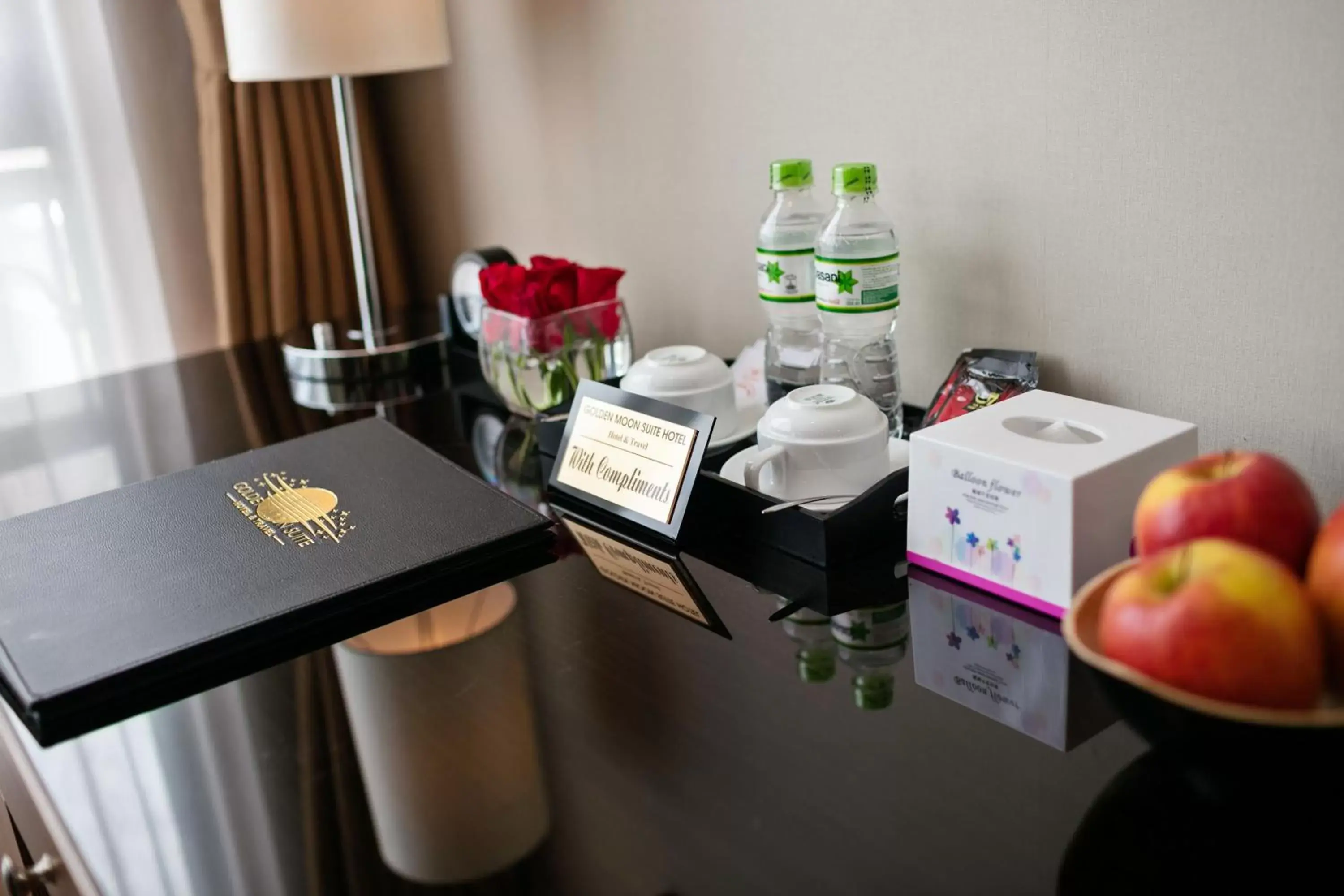 Photo of the whole room, Coffee/Tea Facilities in Golden Moon Suite Hotel