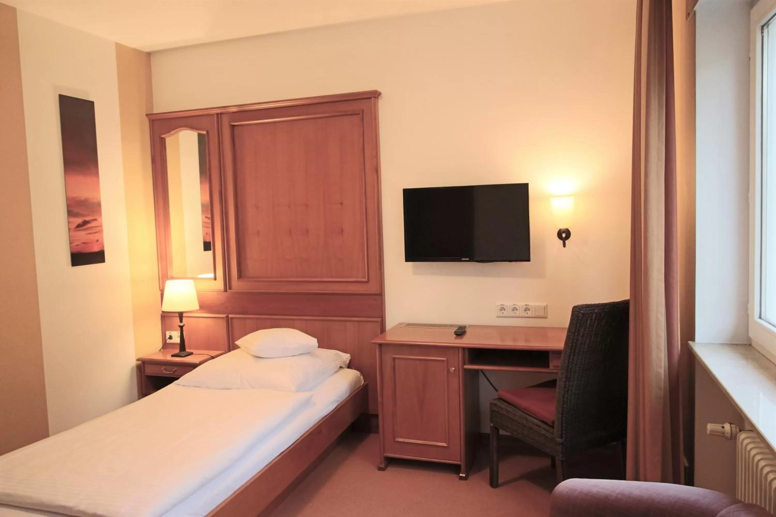 Photo of the whole room, Bed in Hardtwald Hotel