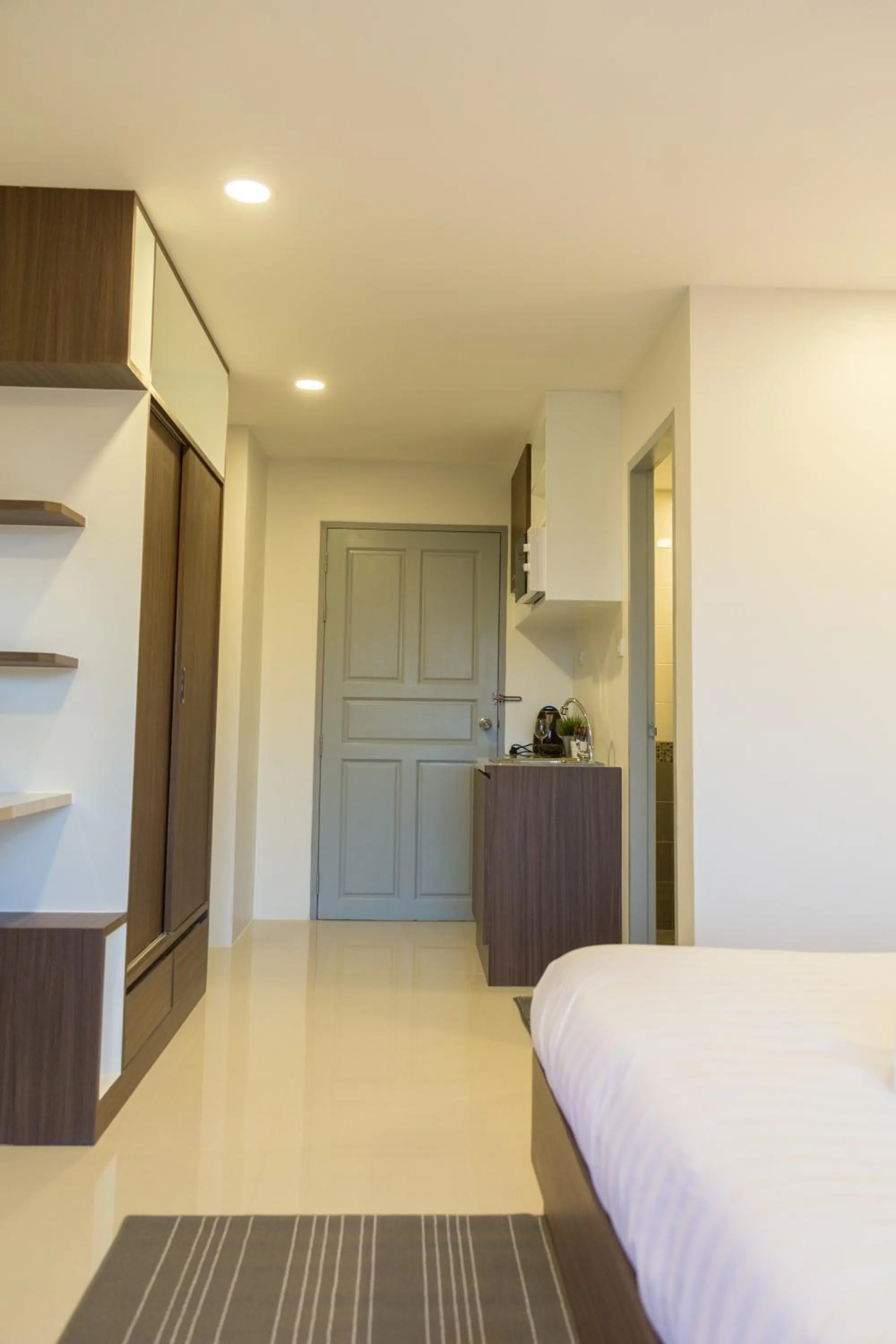 Living room, Bed in Q Space Residence