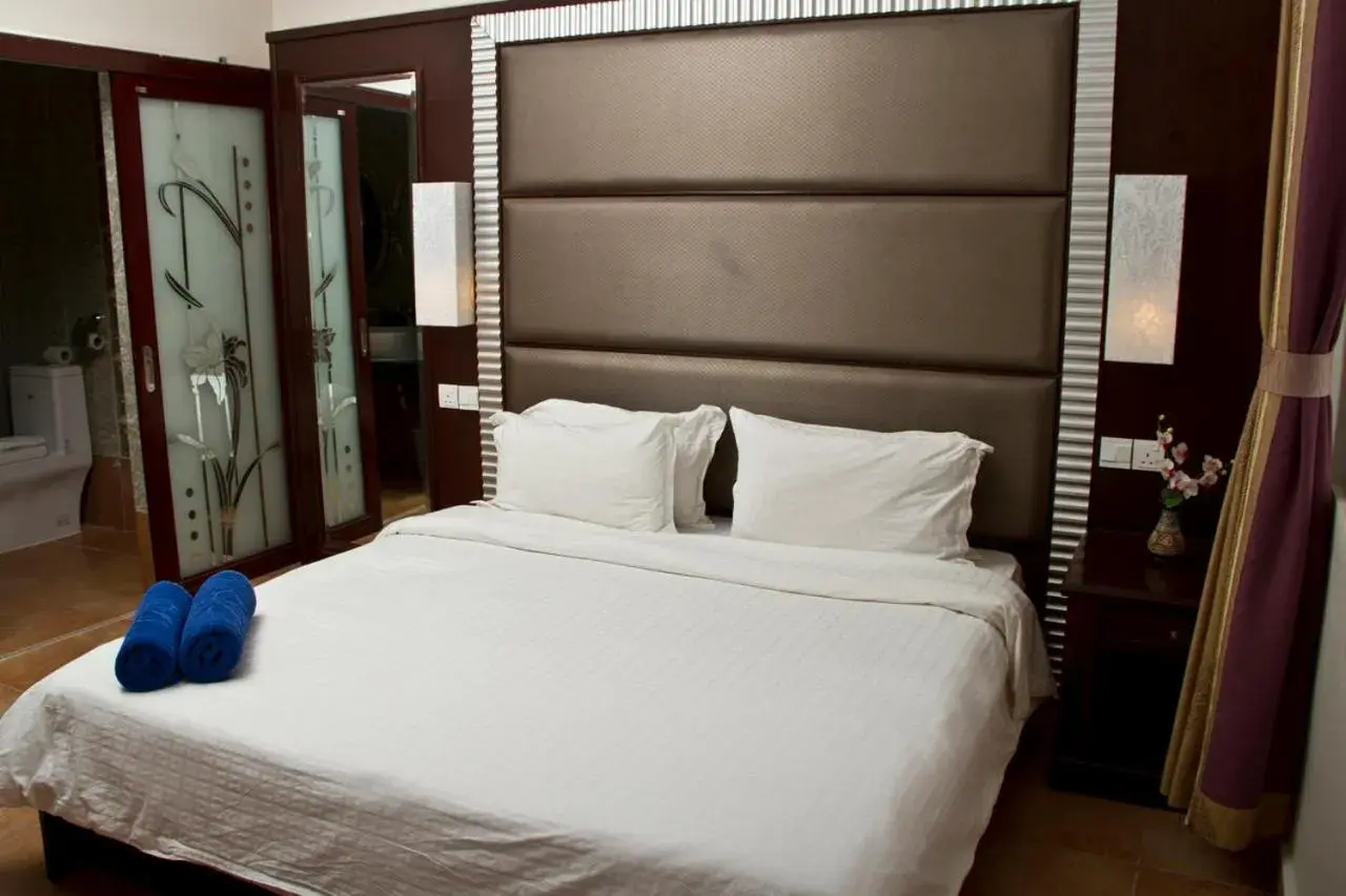 Bed in Beringgis Beach Resort & Spa