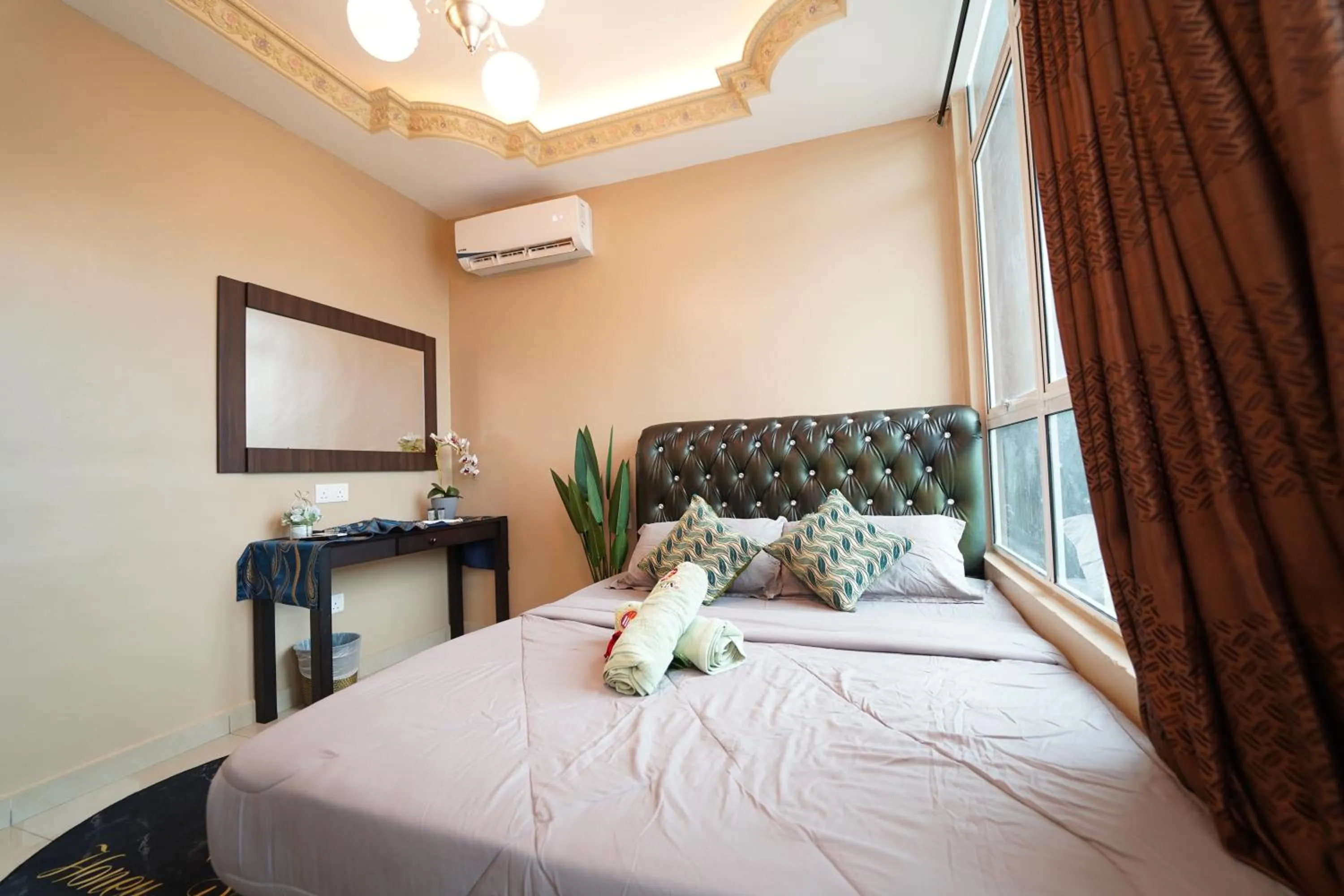 Bed in Ghazrin's Classic Hotel JB