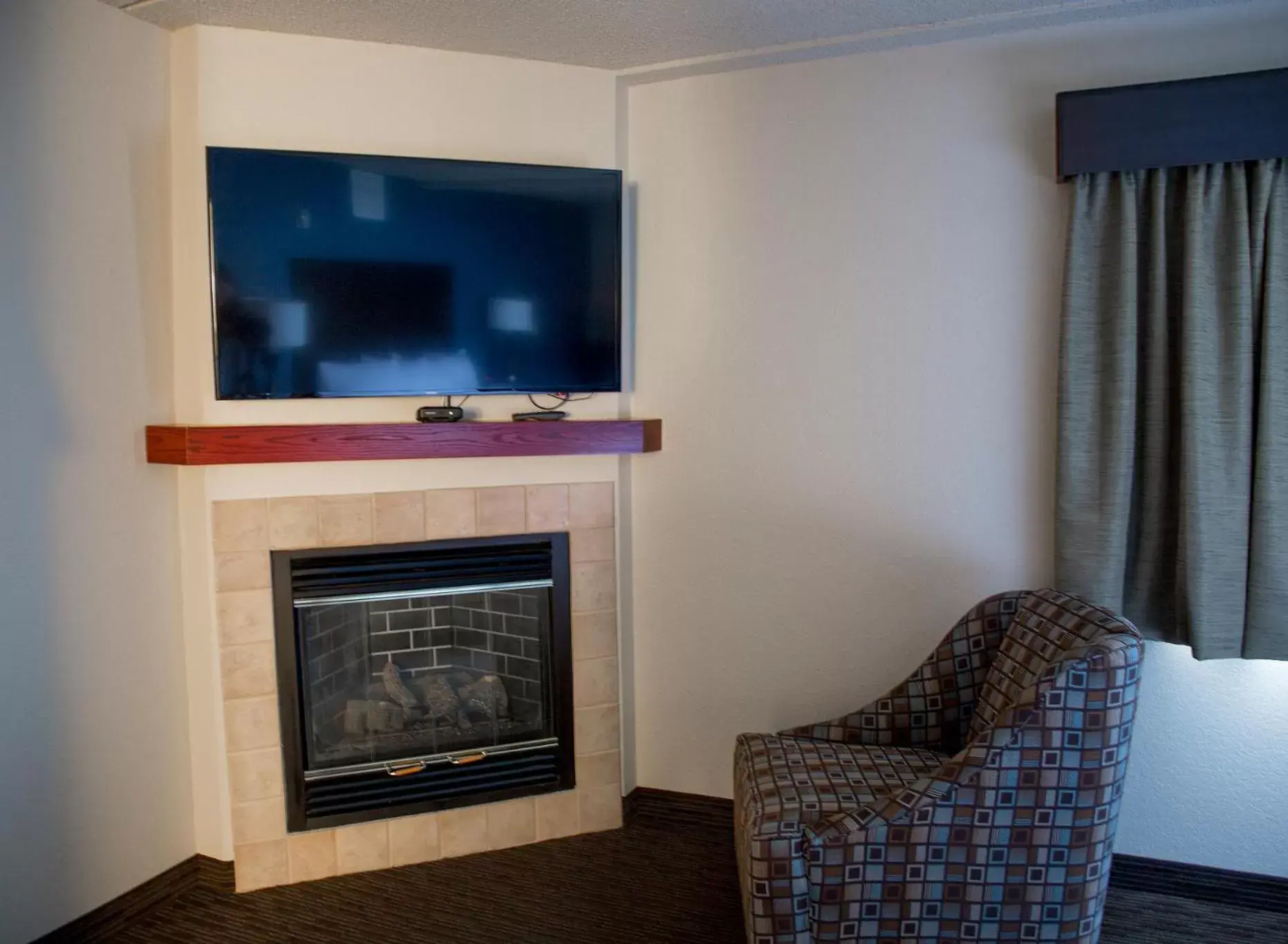 Decorative detail, TV/Entertainment Center in AmericInn by Wyndham Mounds View Minneapolis