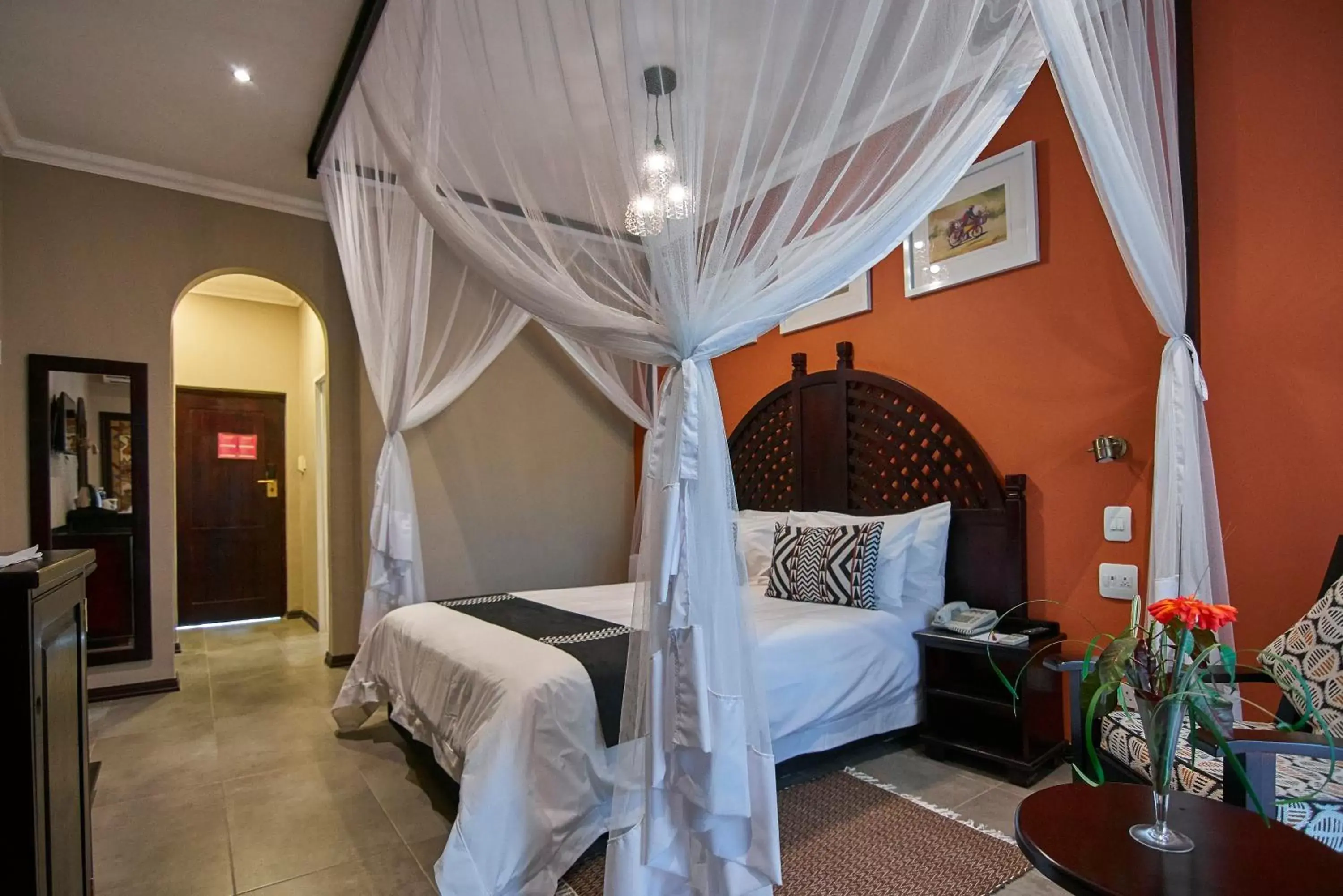 Bed in Victoria Falls Rainbow Hotel