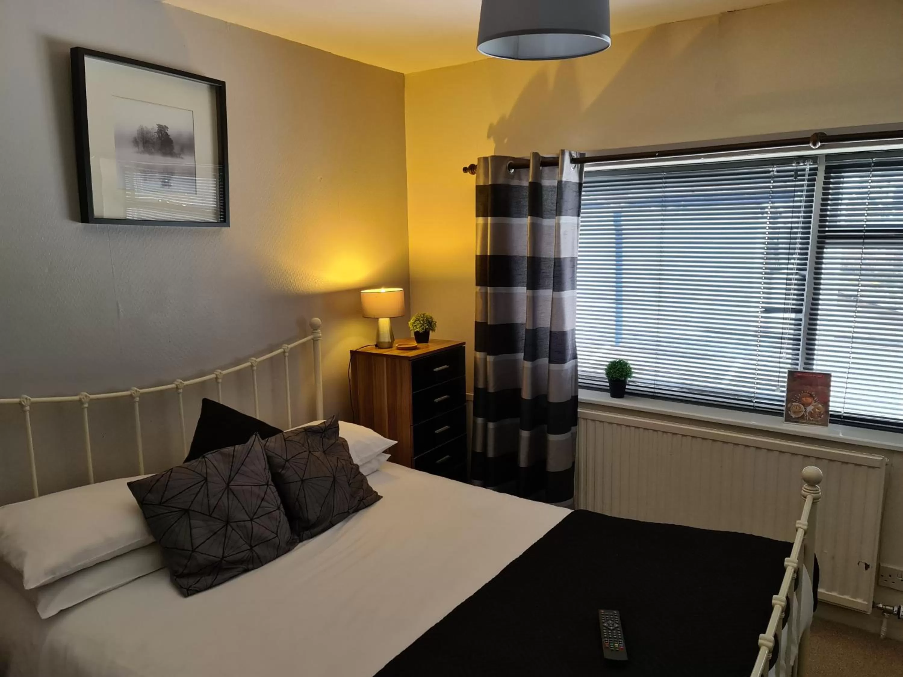 Bed in The Lamb and Flag Inn