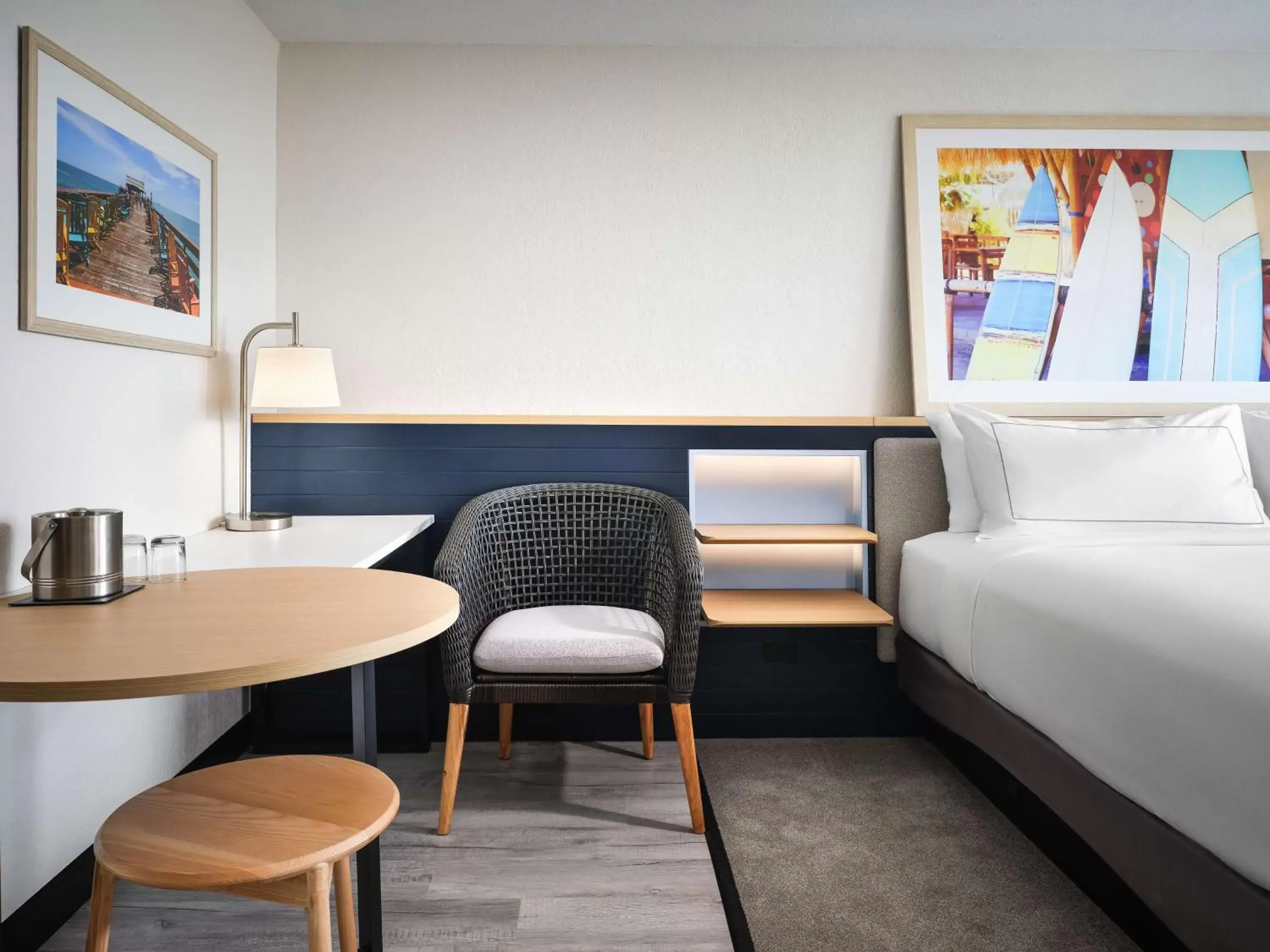 Bed, Seating Area in Hilton Garden Inn Cocoa Beach-Oceanfront, FL