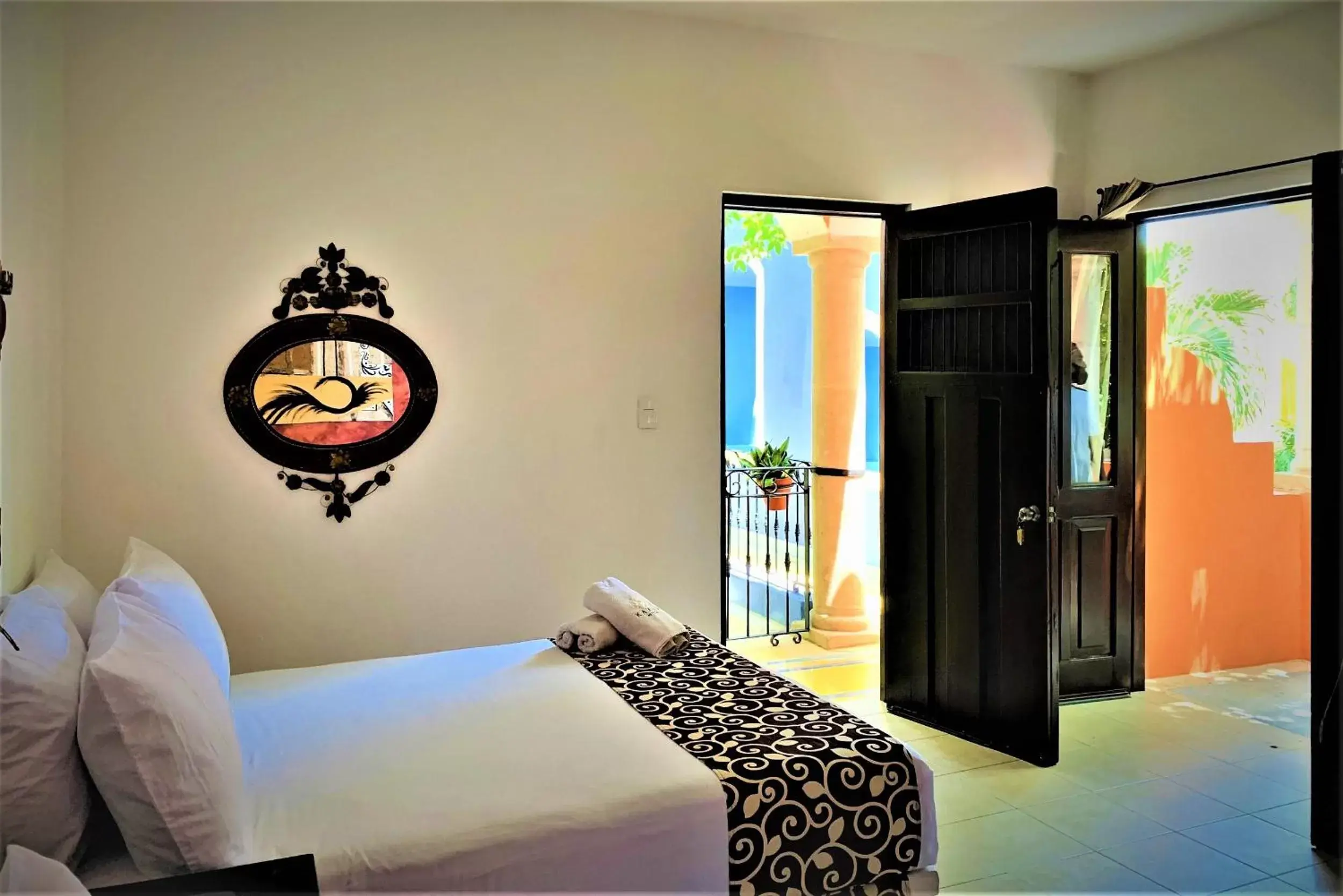 View (from property/room), Bed in Hotel Casa de las Flores