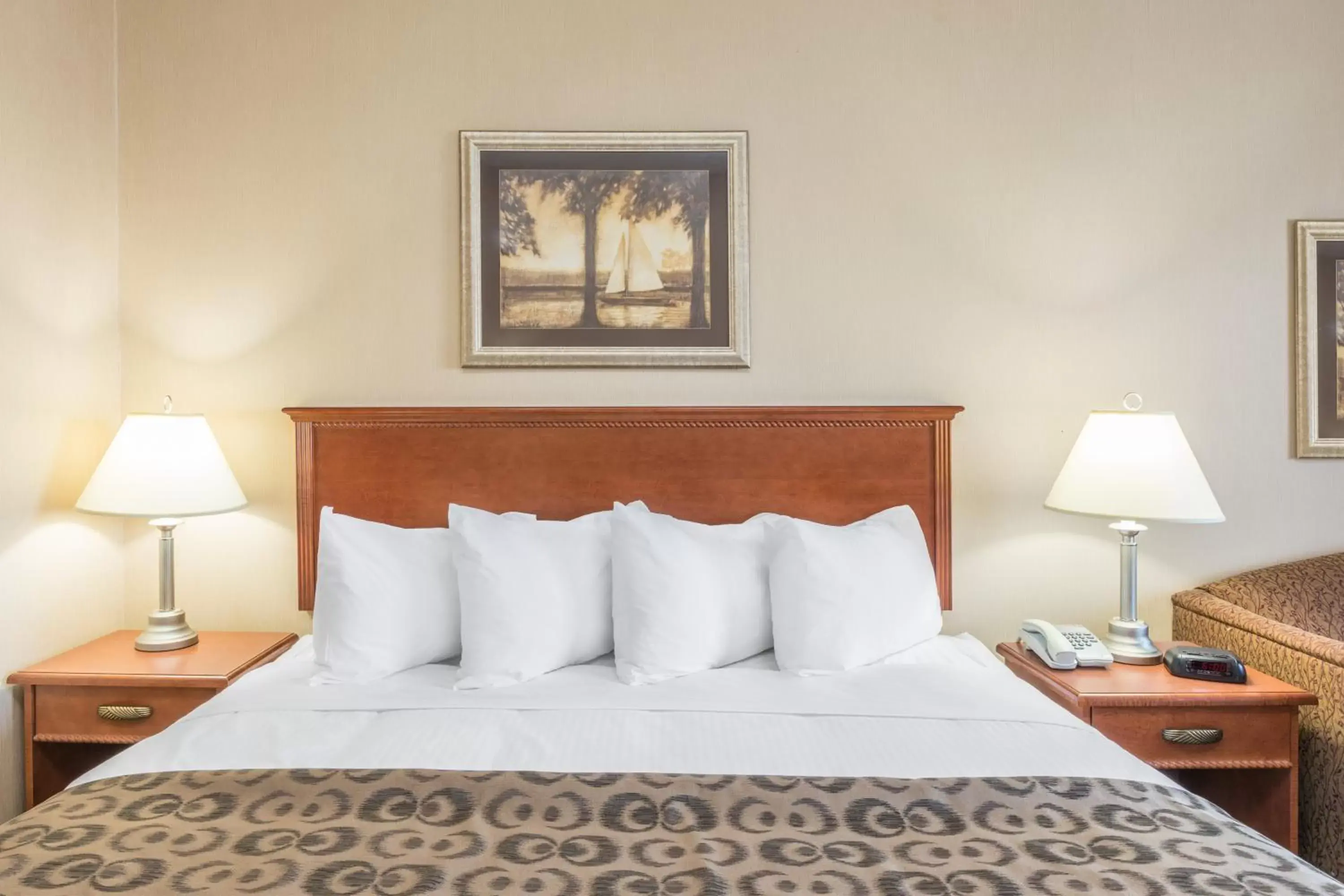 Decorative detail, Bed in Ramada by Wyndham Clairmont/Grande Prairie