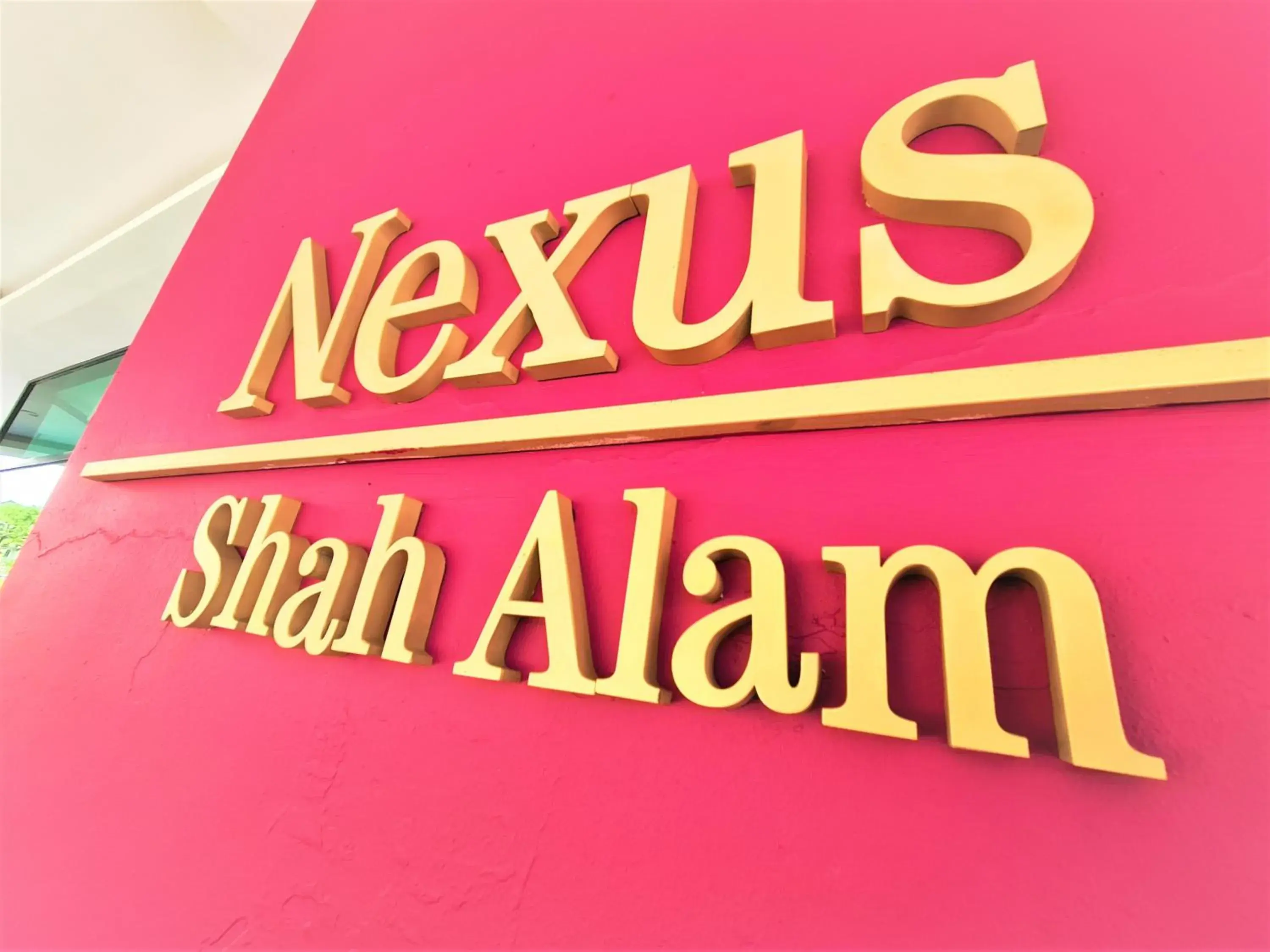 Property logo or sign in Nexus Business Suite Hotel