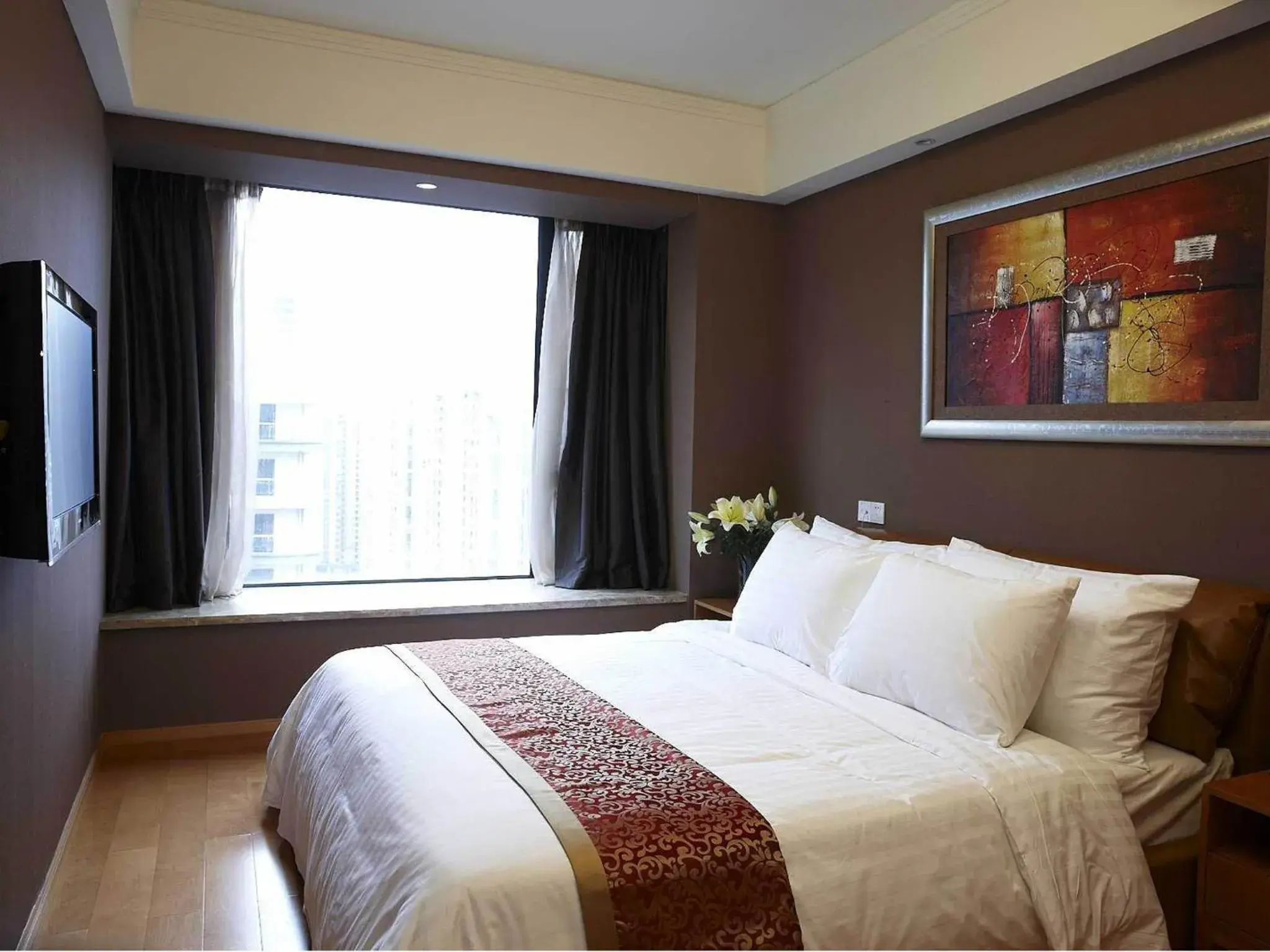 Bed in Dan Executive Hotel Apartment Zhujiang New Town