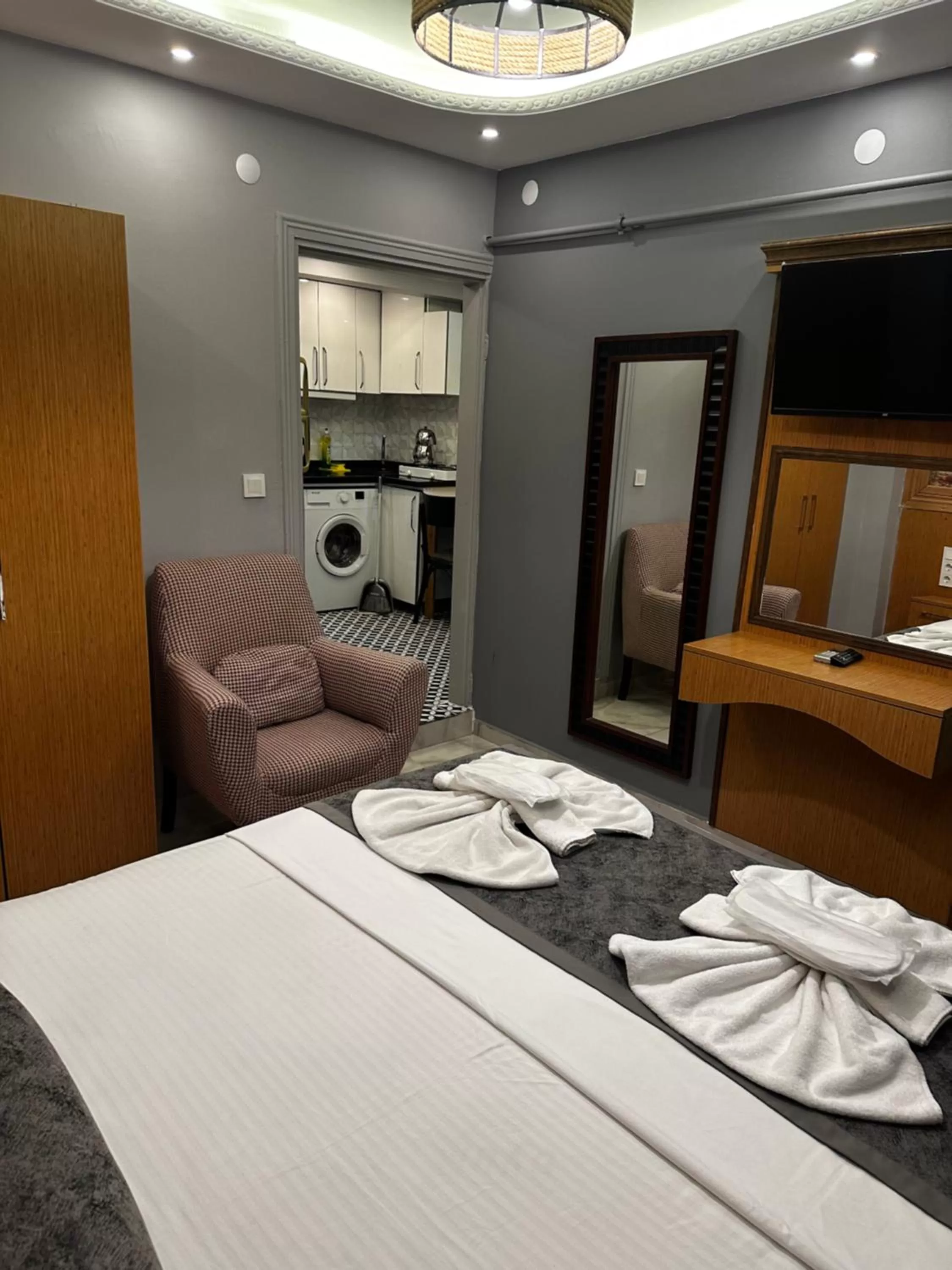 Living room, Bed in Arat Apartments