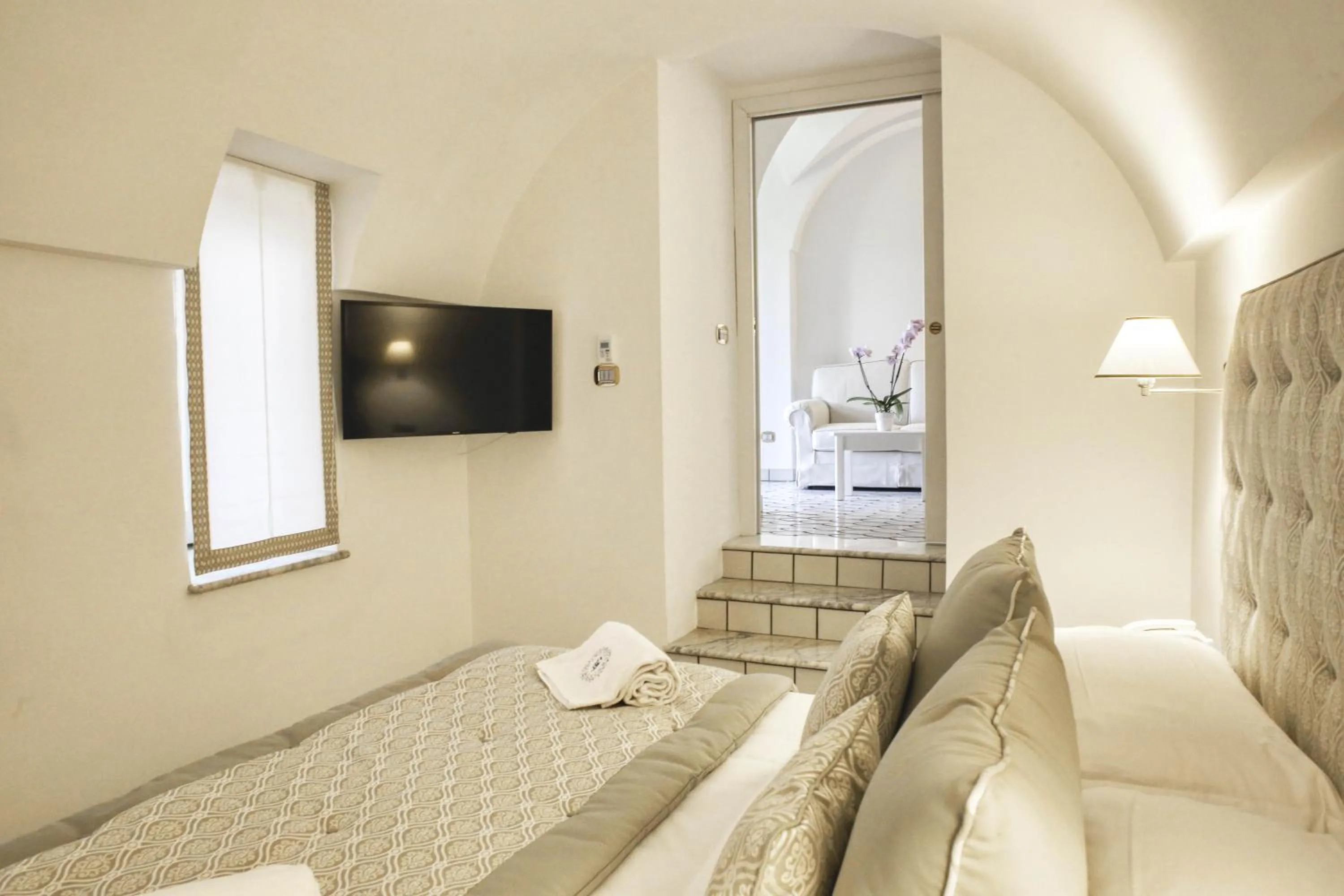 Photo of the whole room, Bed in Palazzo Confalone