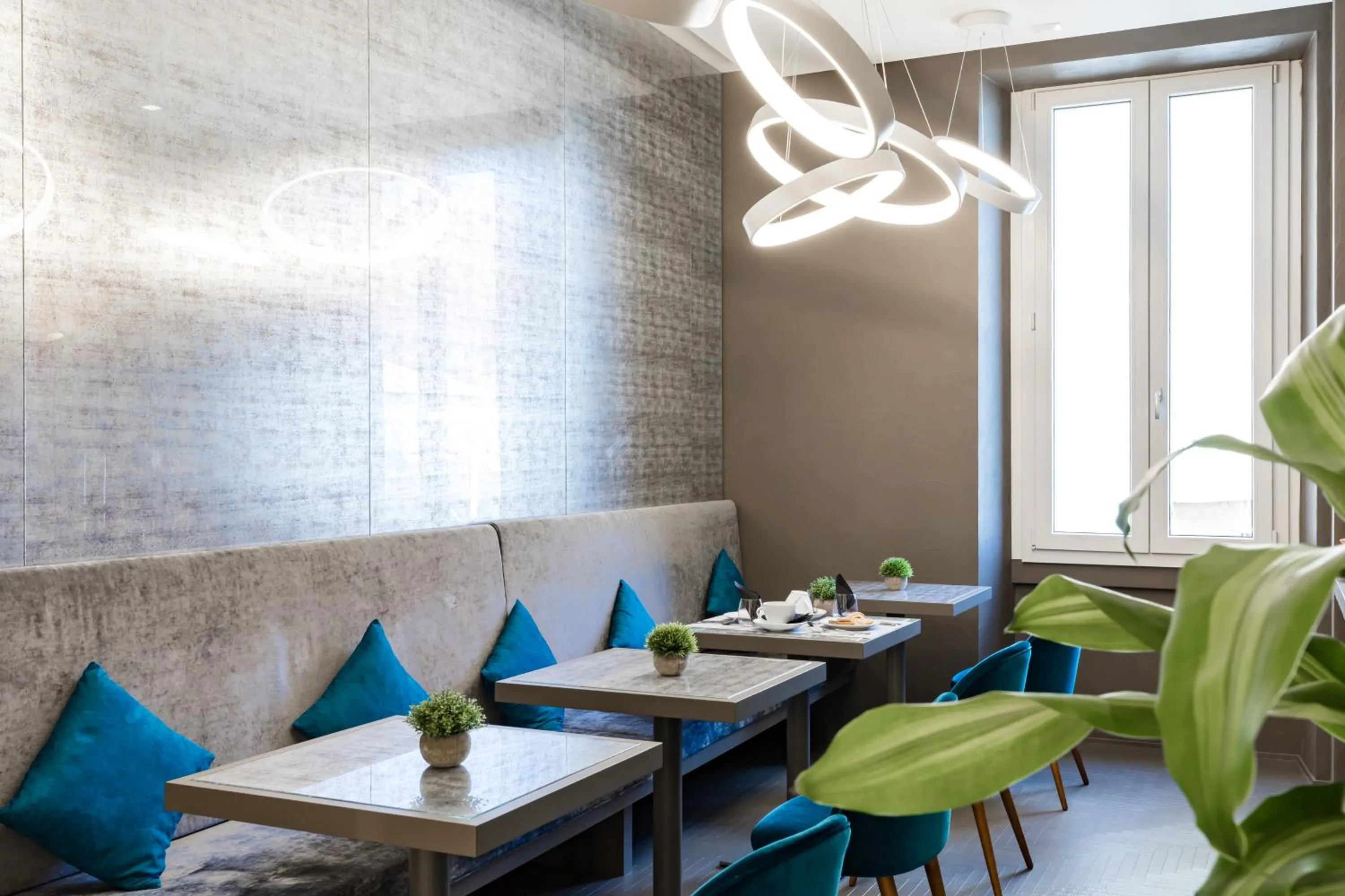 Communal lounge/ TV room in A World Aparts - Barberini Boutique Hotel