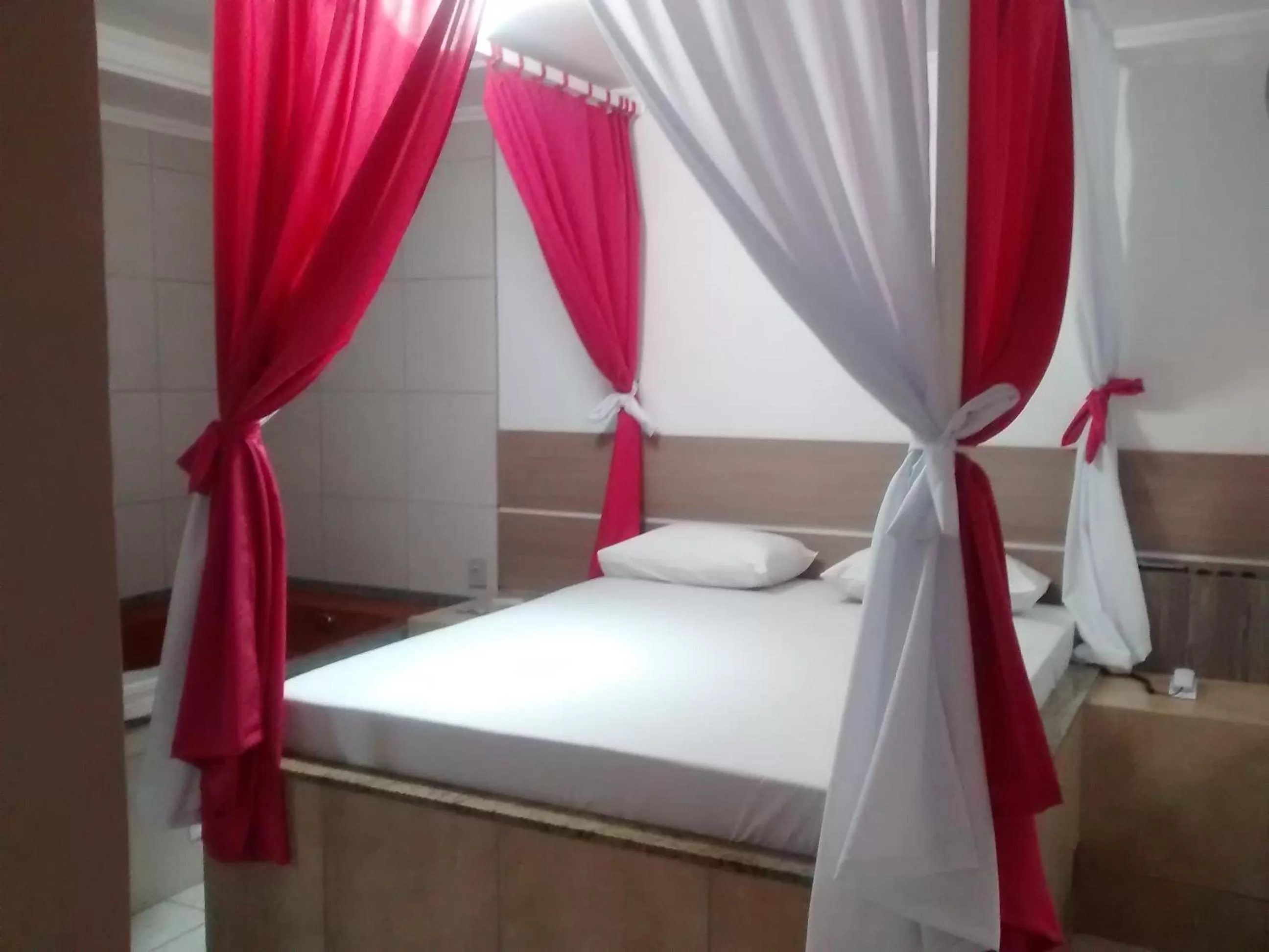 Bedroom in Classic Hotel e Motel