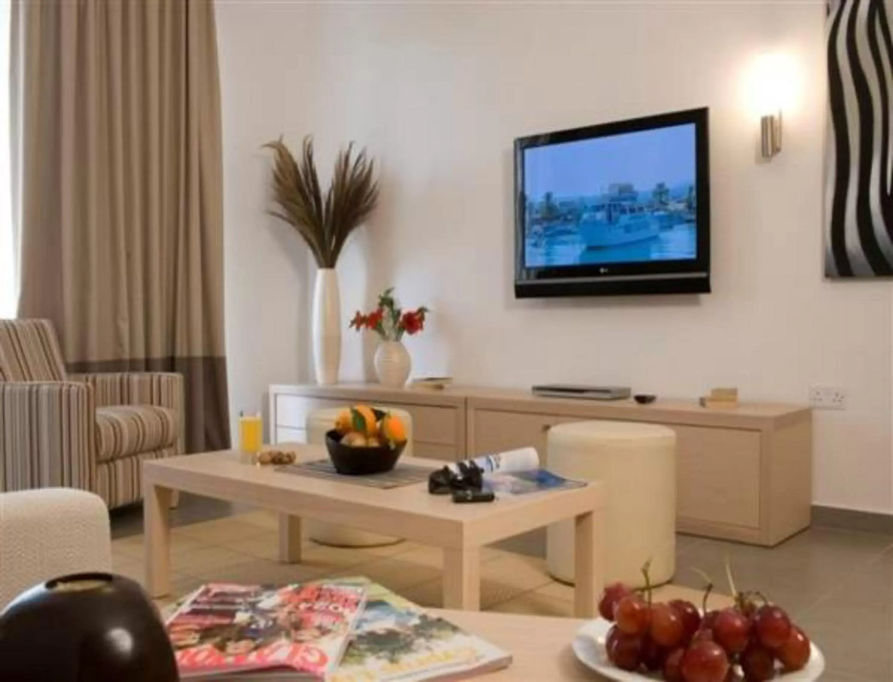 TV/Entertainment Center in Capital Coast Resort And Spa