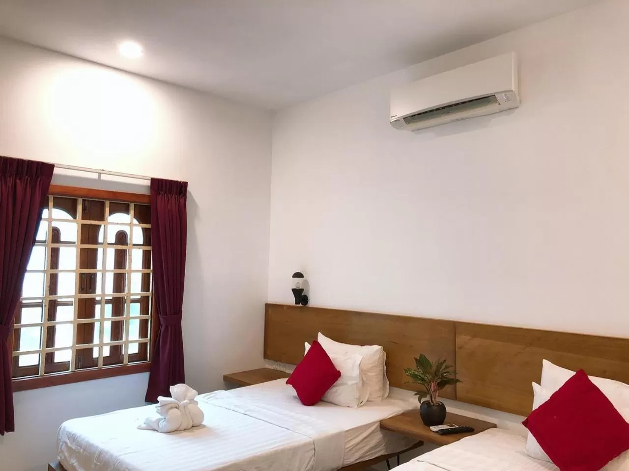 Bed in Poolside Villa