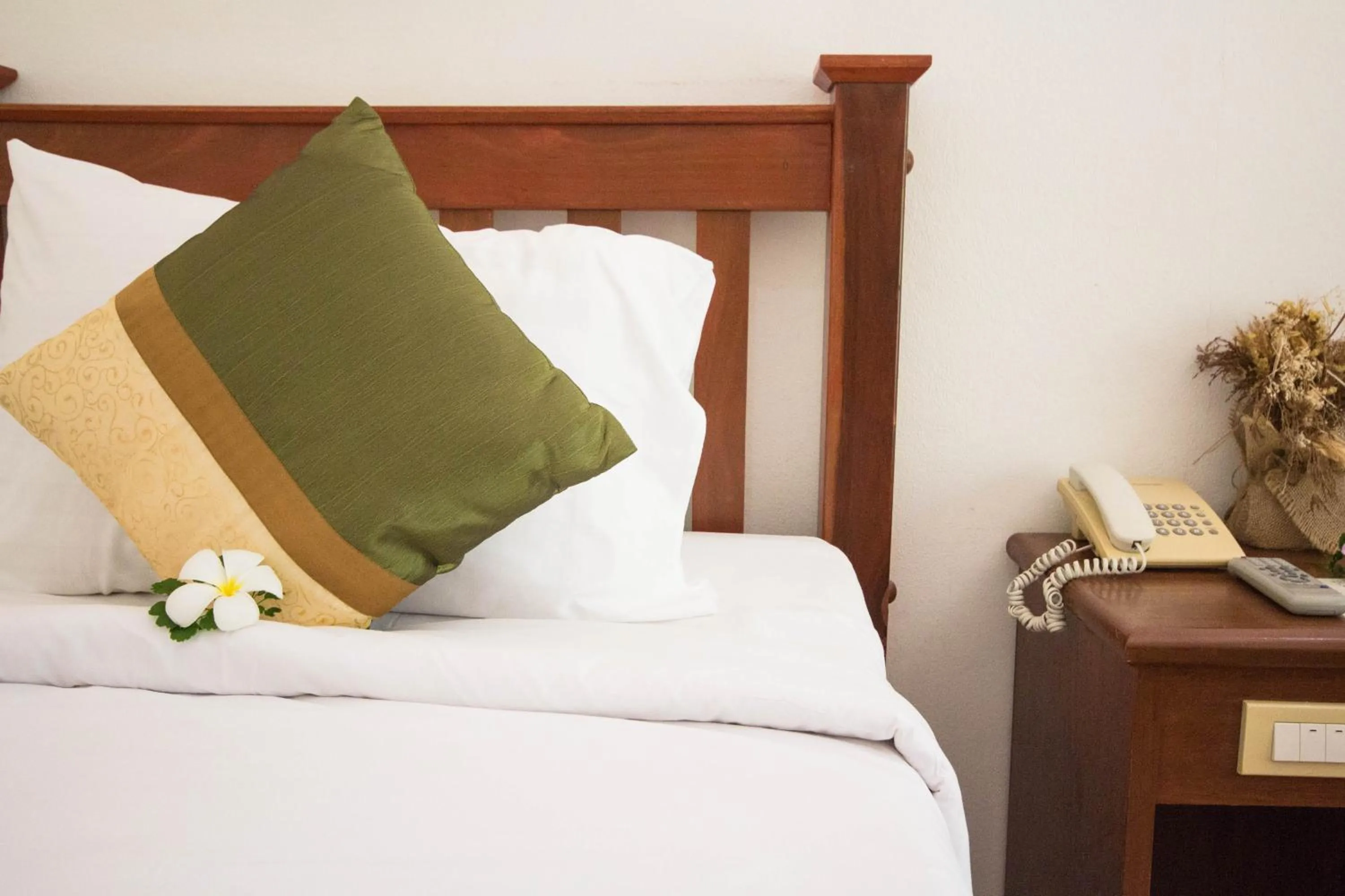 Bed in Rajapruek Samui Resort - SHA Plus