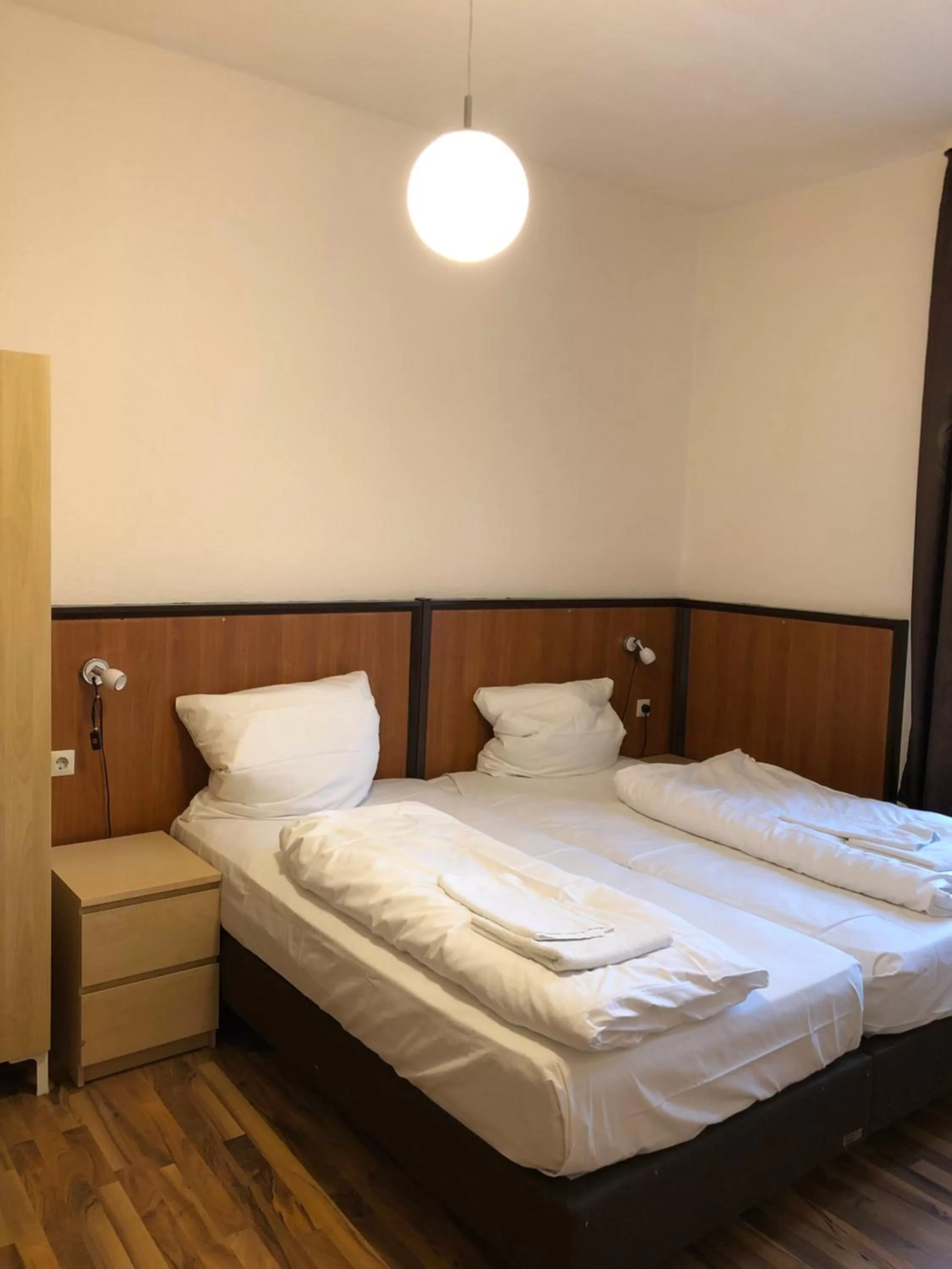 Bed in Hotel Poseidon