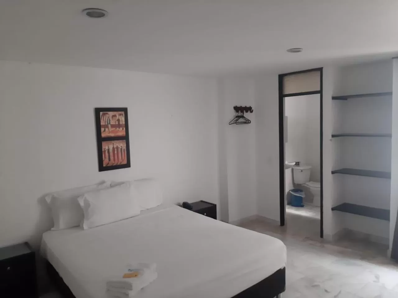 Bed in Blue Star Hotel