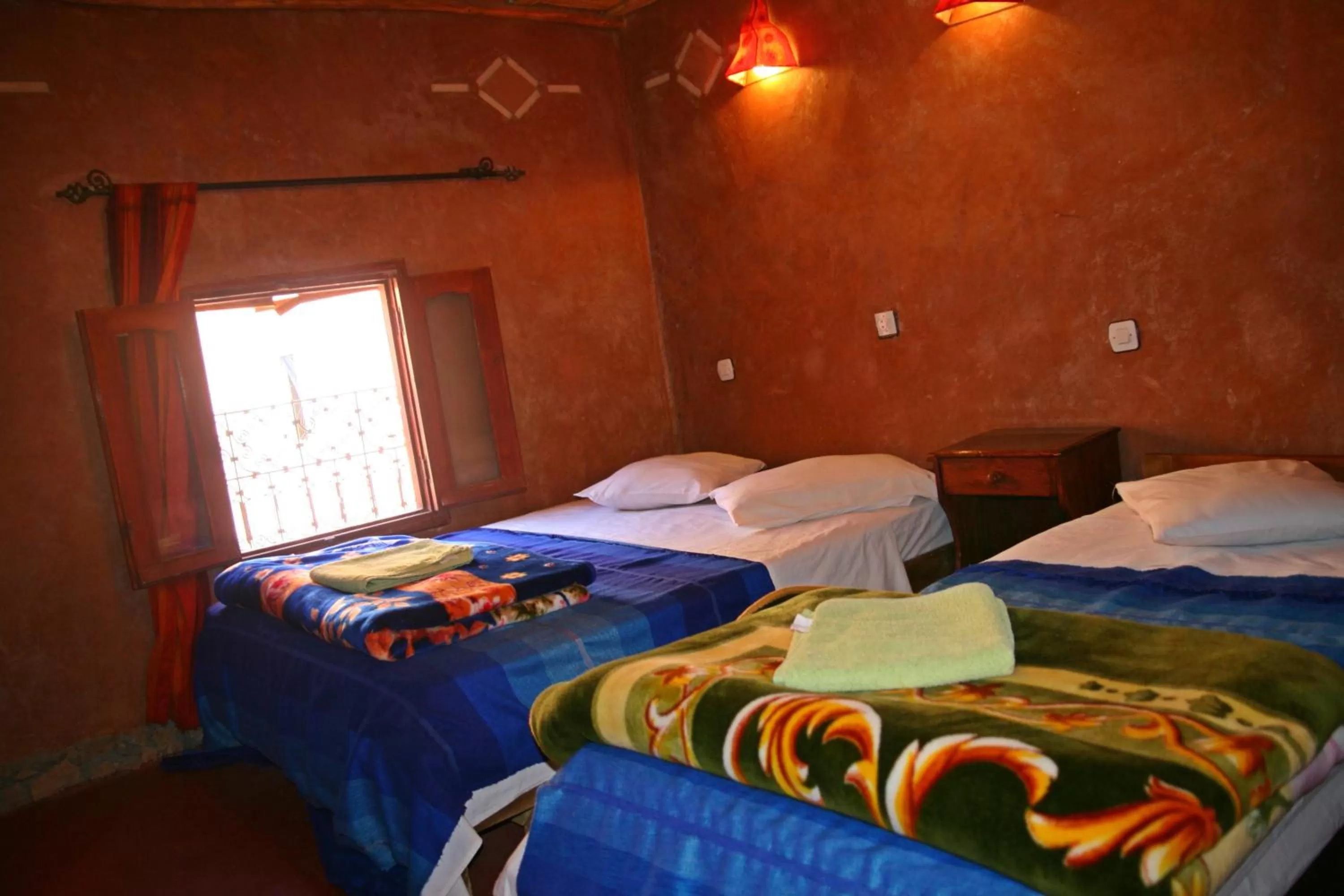 Bed in Maison d'Hôte Valentine