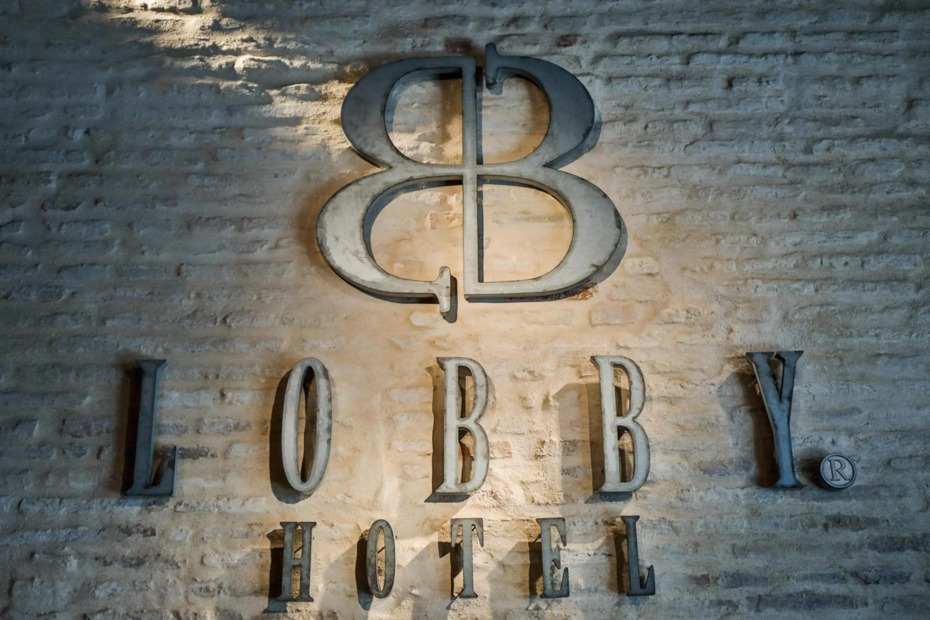 Property logo or sign in Hotel Lobby