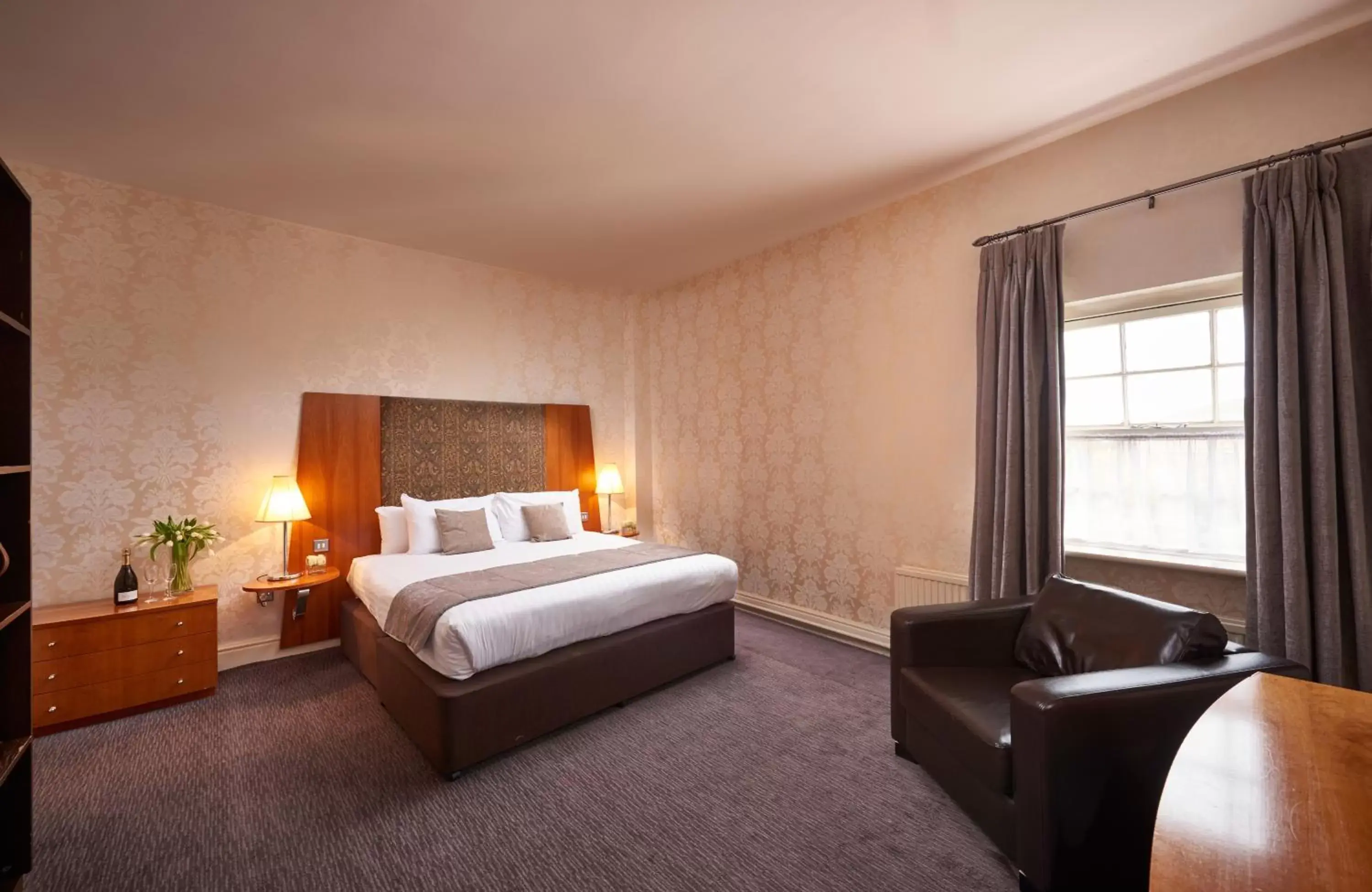 Bed, Room Photo in The Regency Hotel
