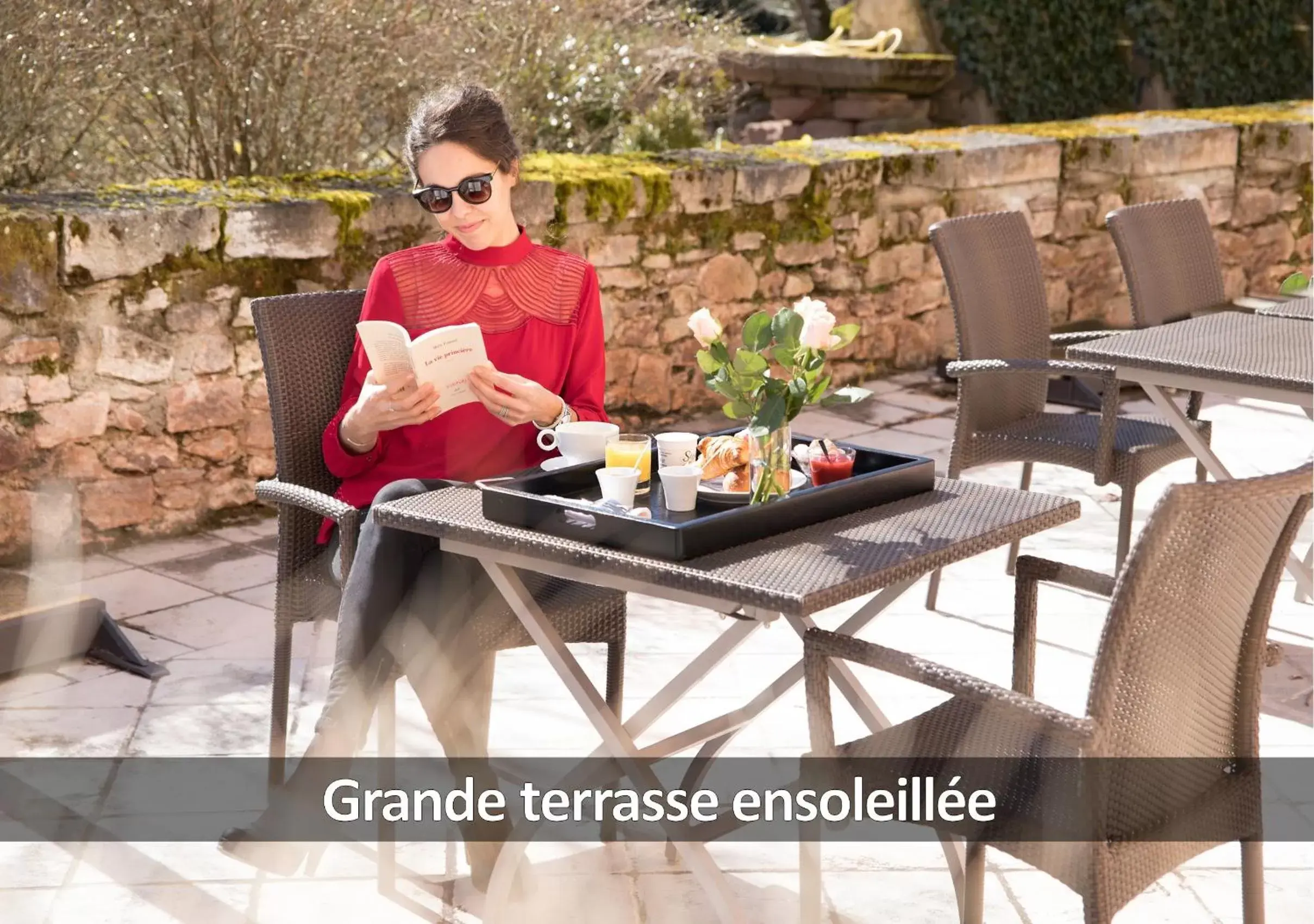 Patio in Hôtel La Ferme de Bourran