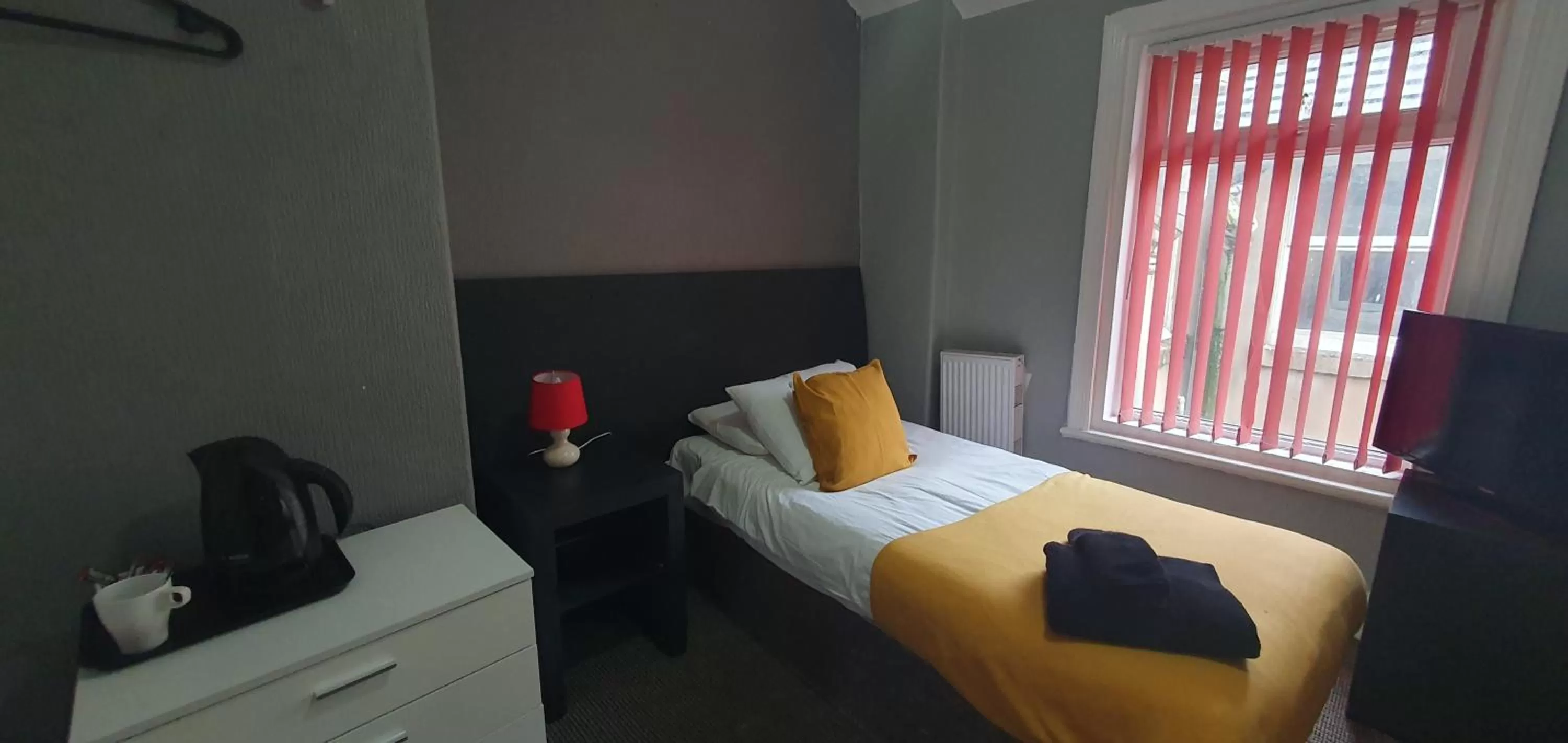 Bed in Palm Beach Hotel by the Sea