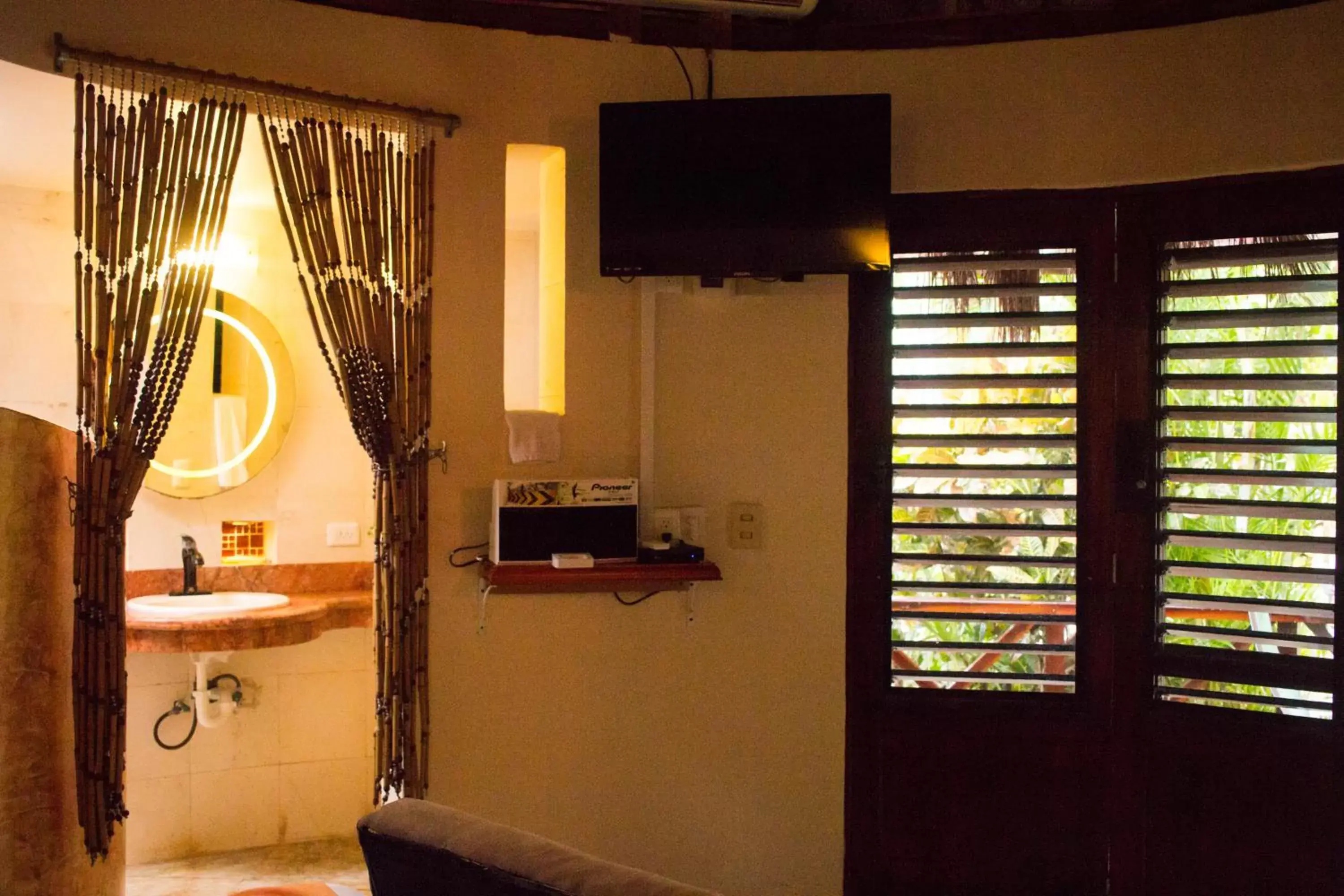 Bathroom, TV/Entertainment Center in Cocos Cabañas Playa del Carmen Adults Only