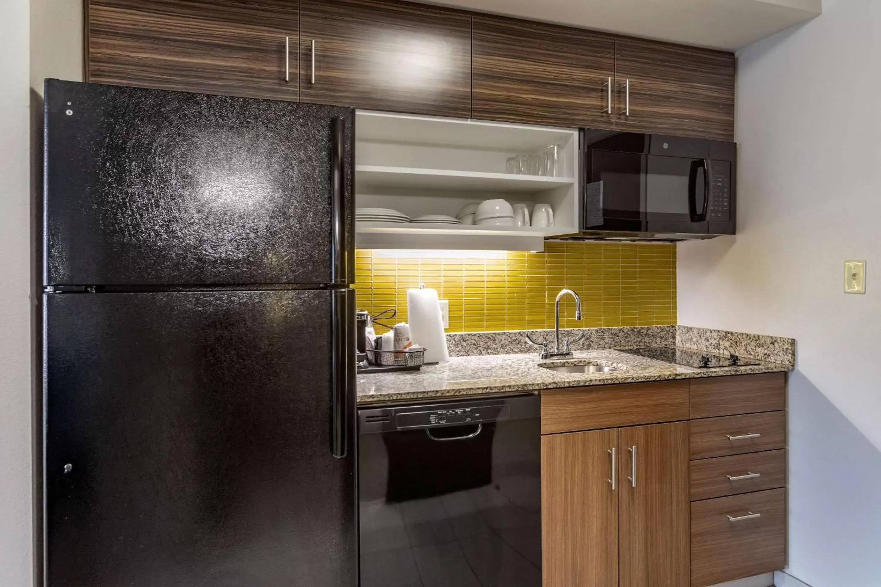 Bedroom, Kitchen/Kitchenette in MainStay Suites