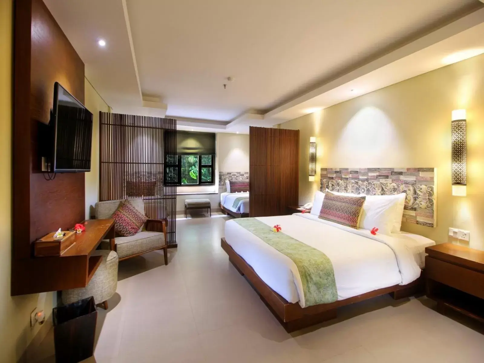 Bed in AlamKulkul Boutique Resort