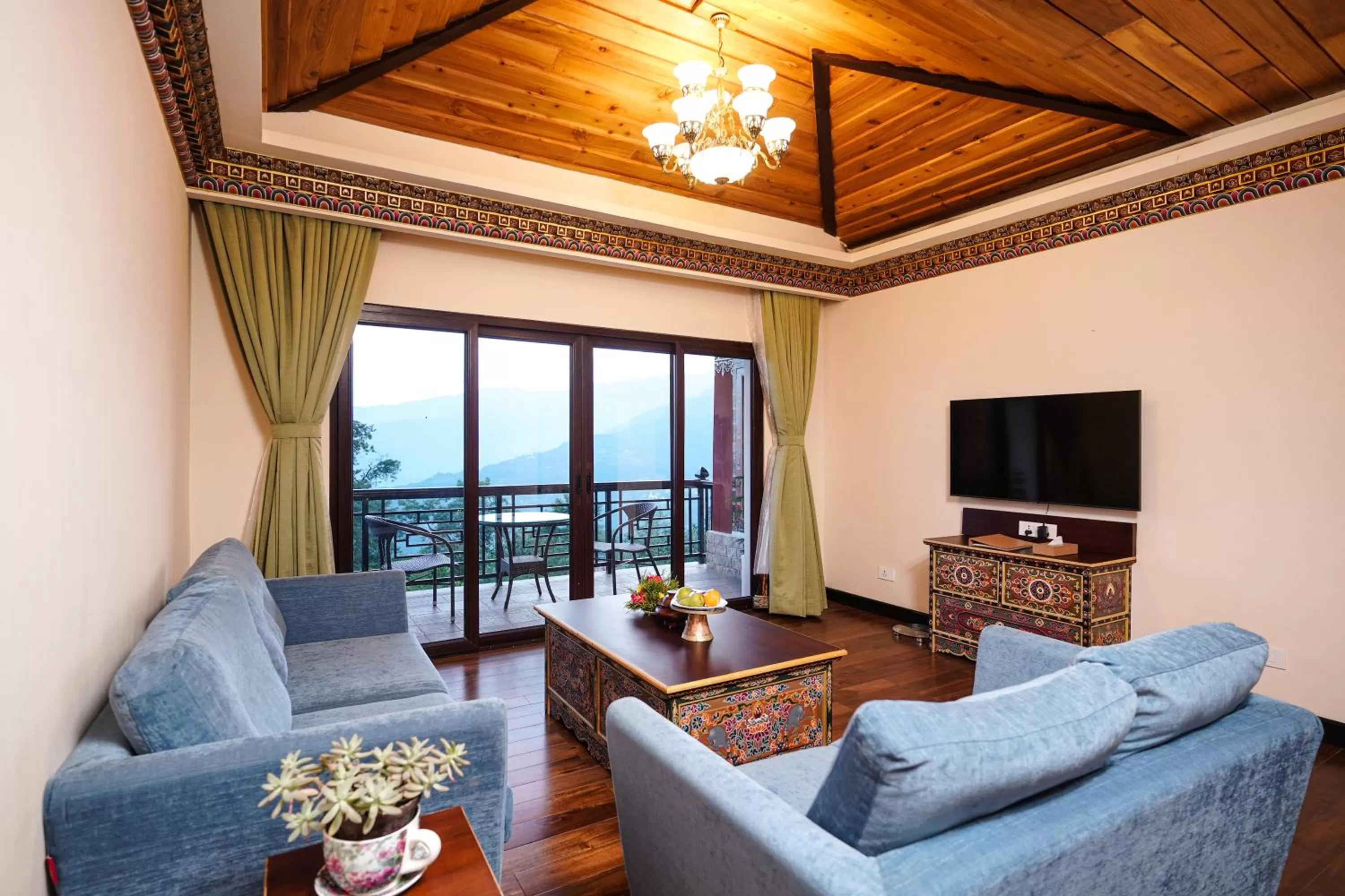 Communal lounge/ TV room in Denzong Regency- Luxury Mountain Retreat Spa & Casino