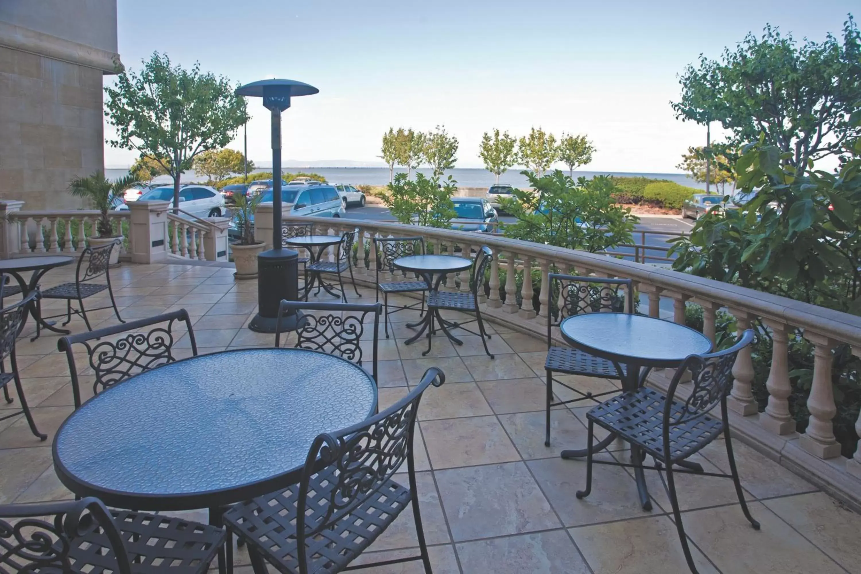 Balcony/Terrace, Pool View in Bay Landing Hotel