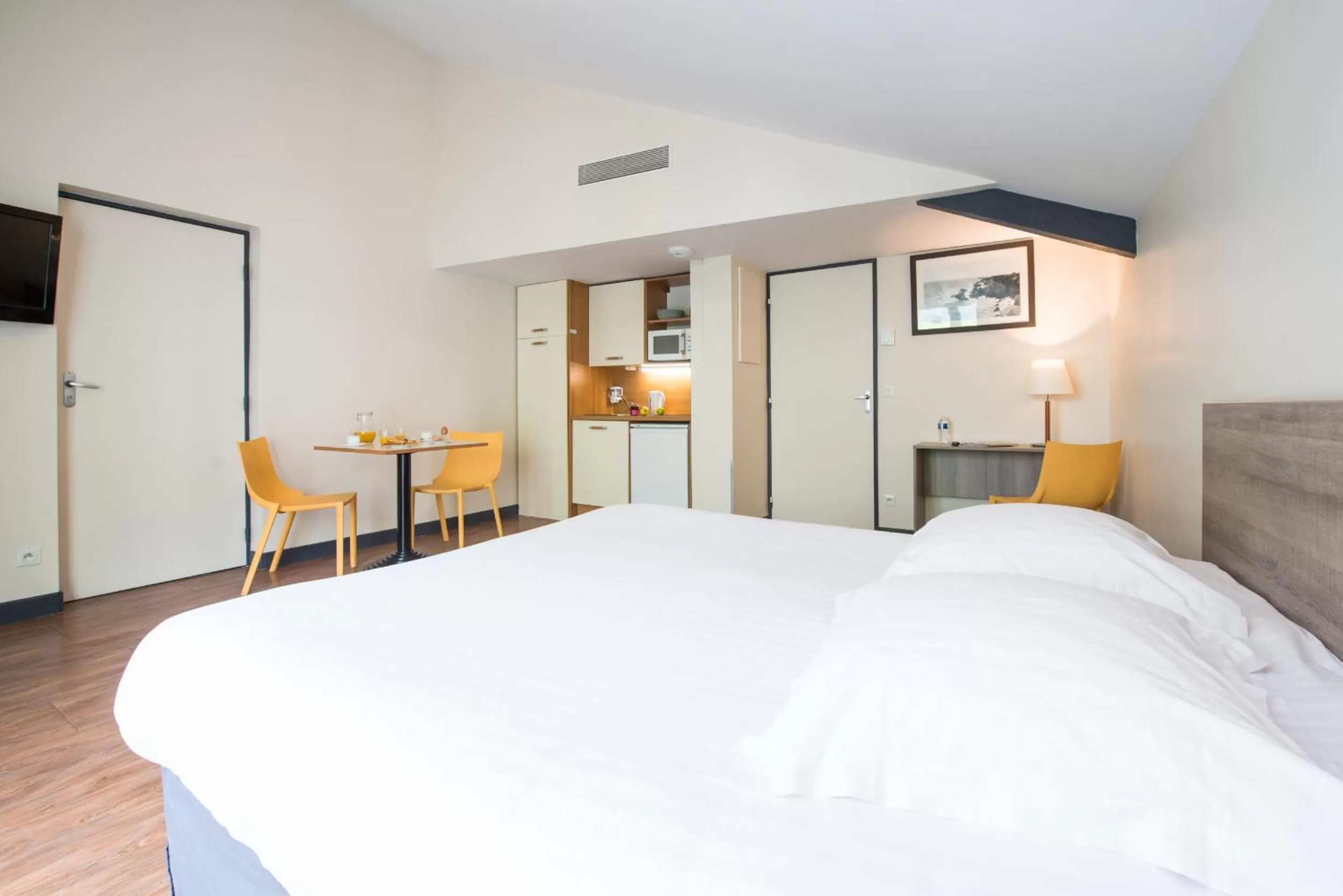 Bed in Comfort Aparthotel Saint-Nazaire Les Portes de l Ocean