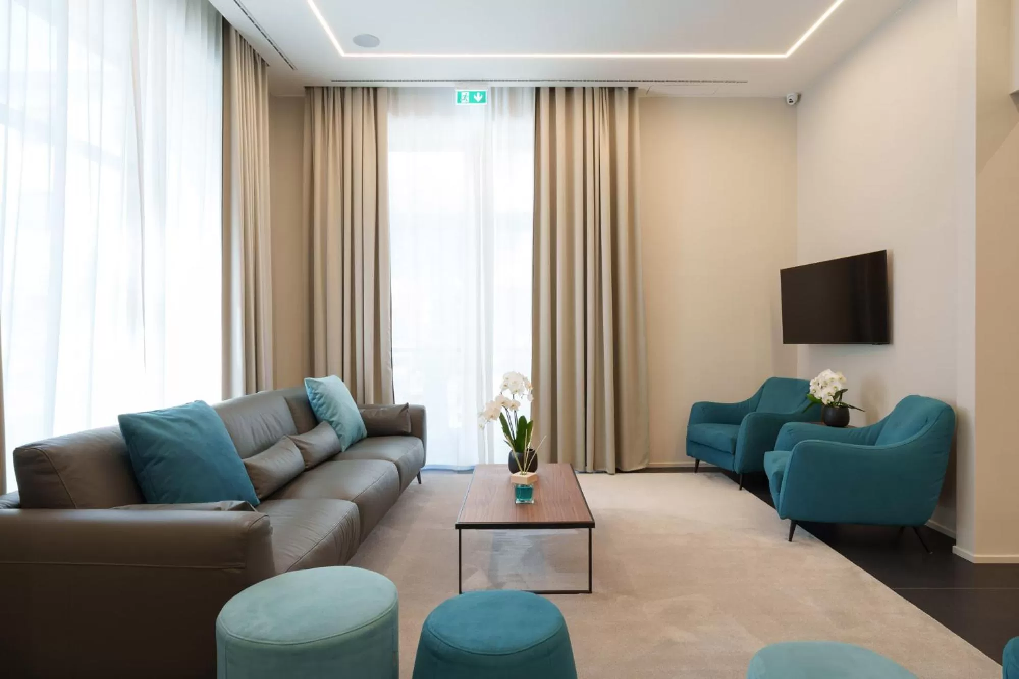 Communal lounge/ TV room in Vi Suites