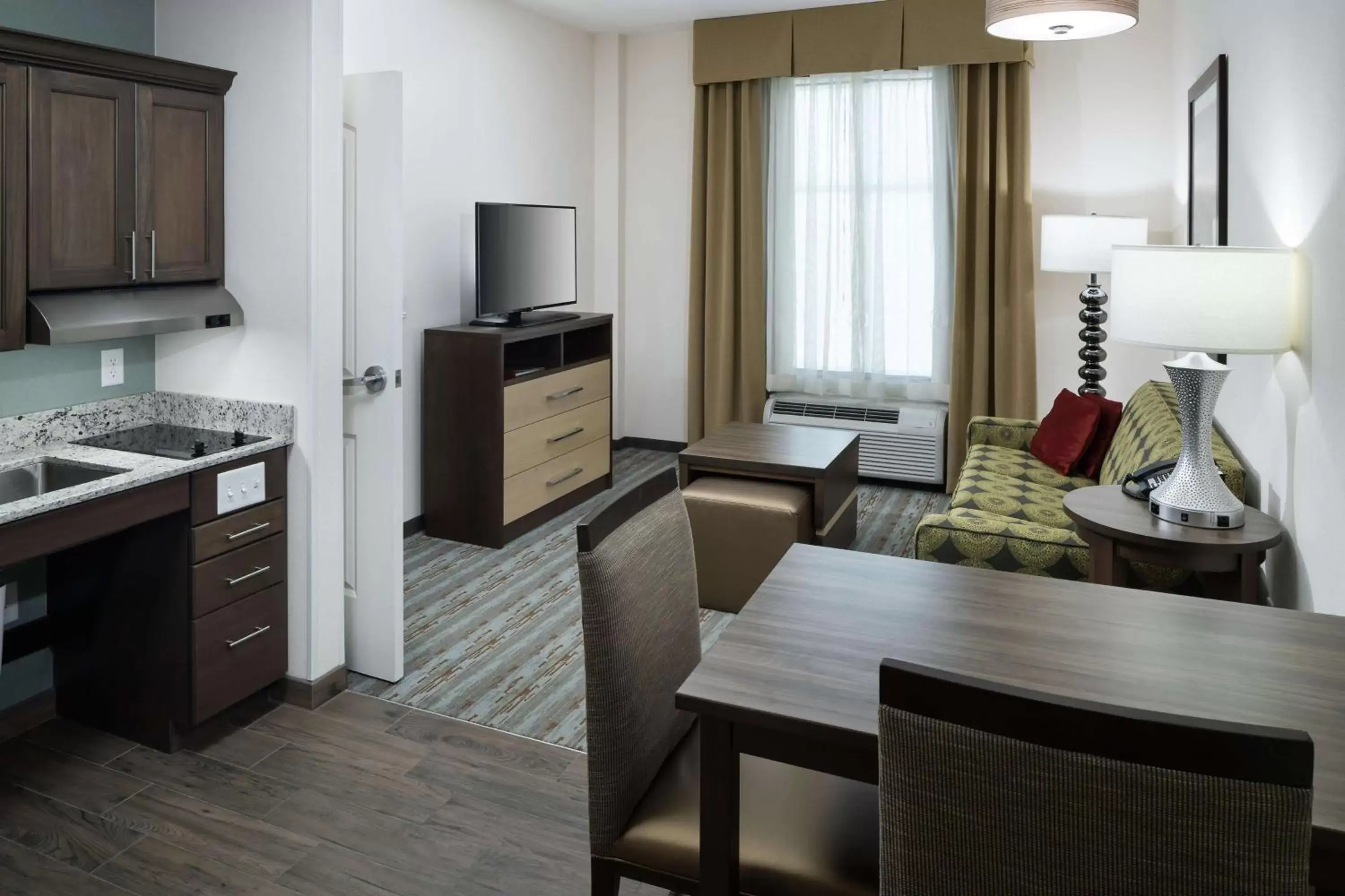 Bedroom, Kitchen/Kitchenette in Homewood Suites by Hilton Cape Canaveral-Cocoa Beach