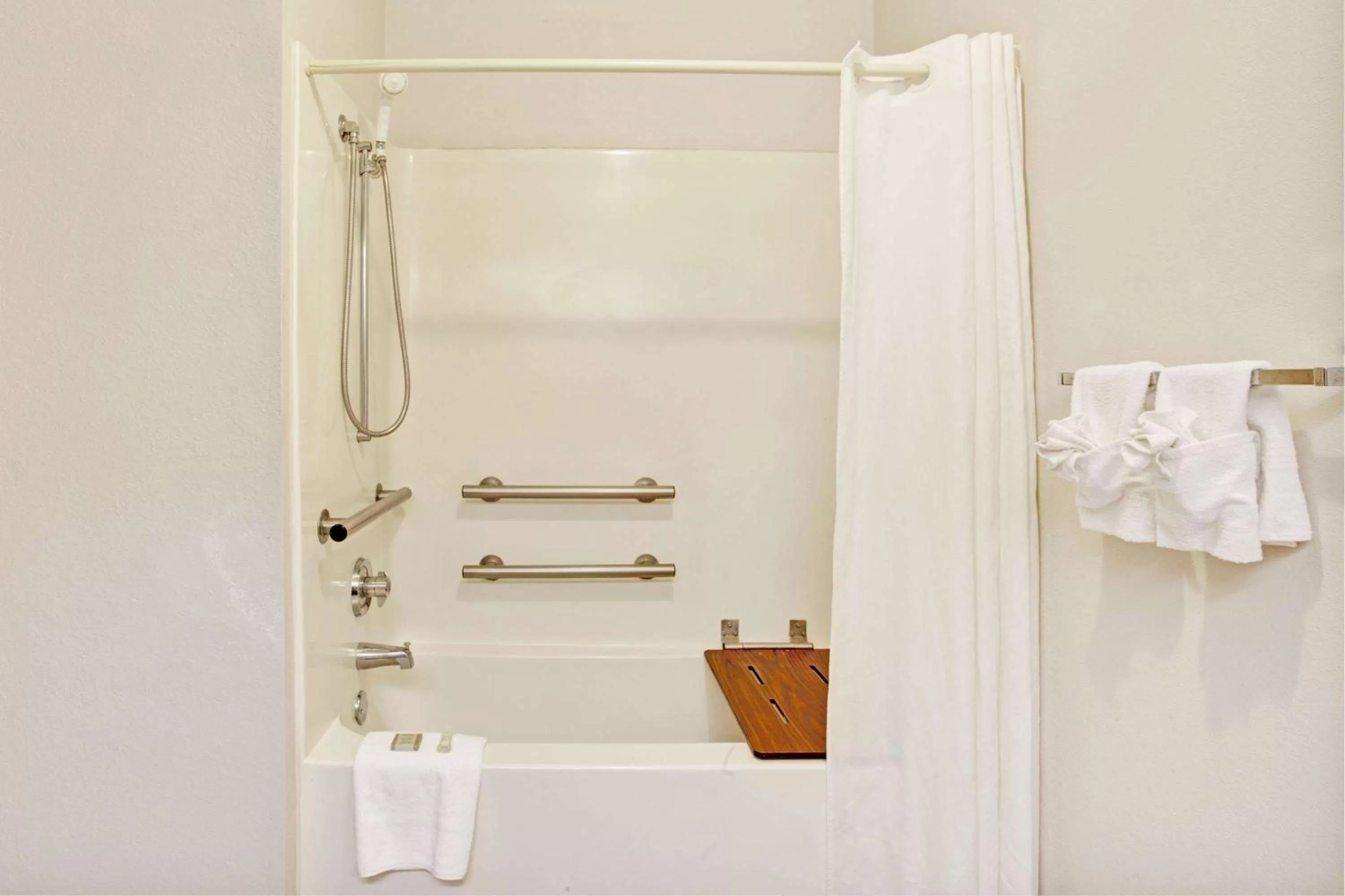 Bathroom in Super 8 by Wyndham Olive Branch