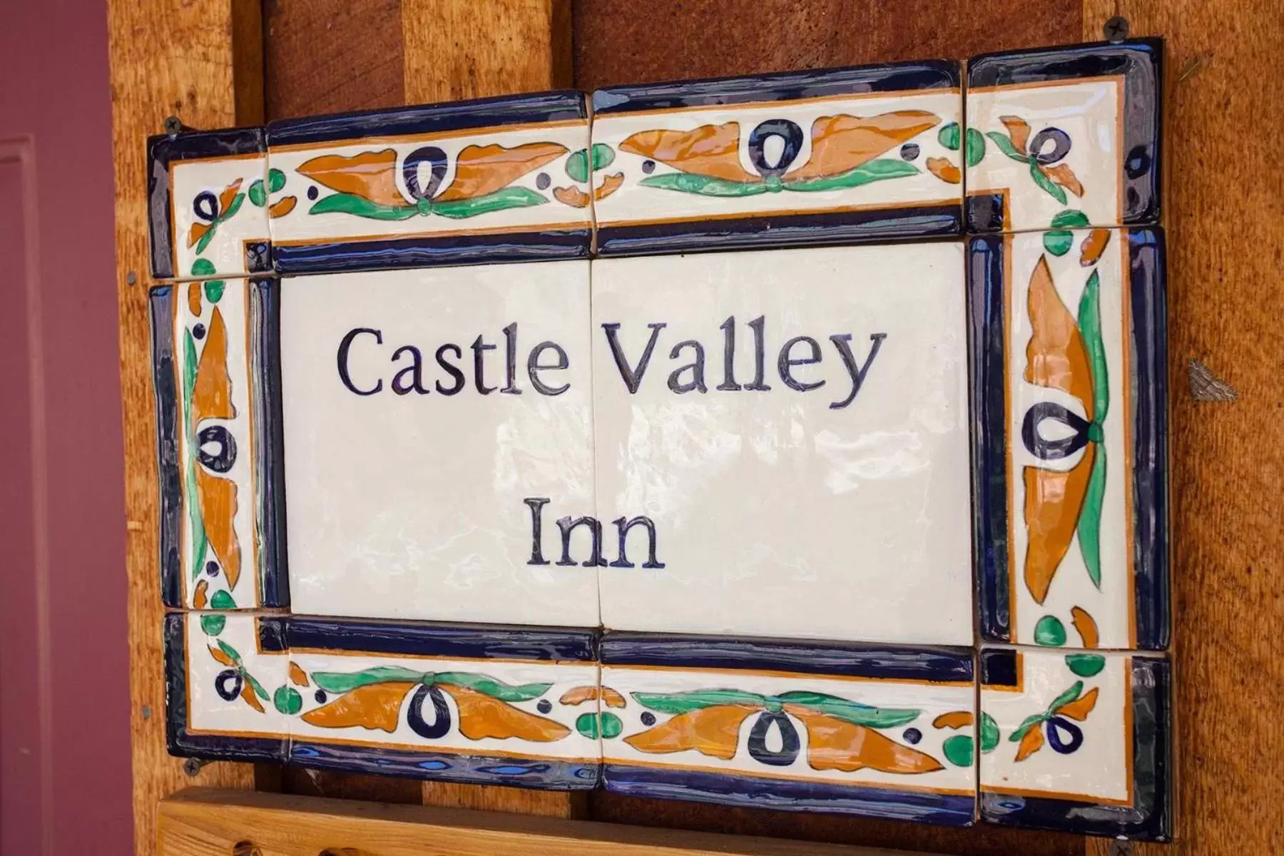 Property logo or sign in Castle Valley Inn