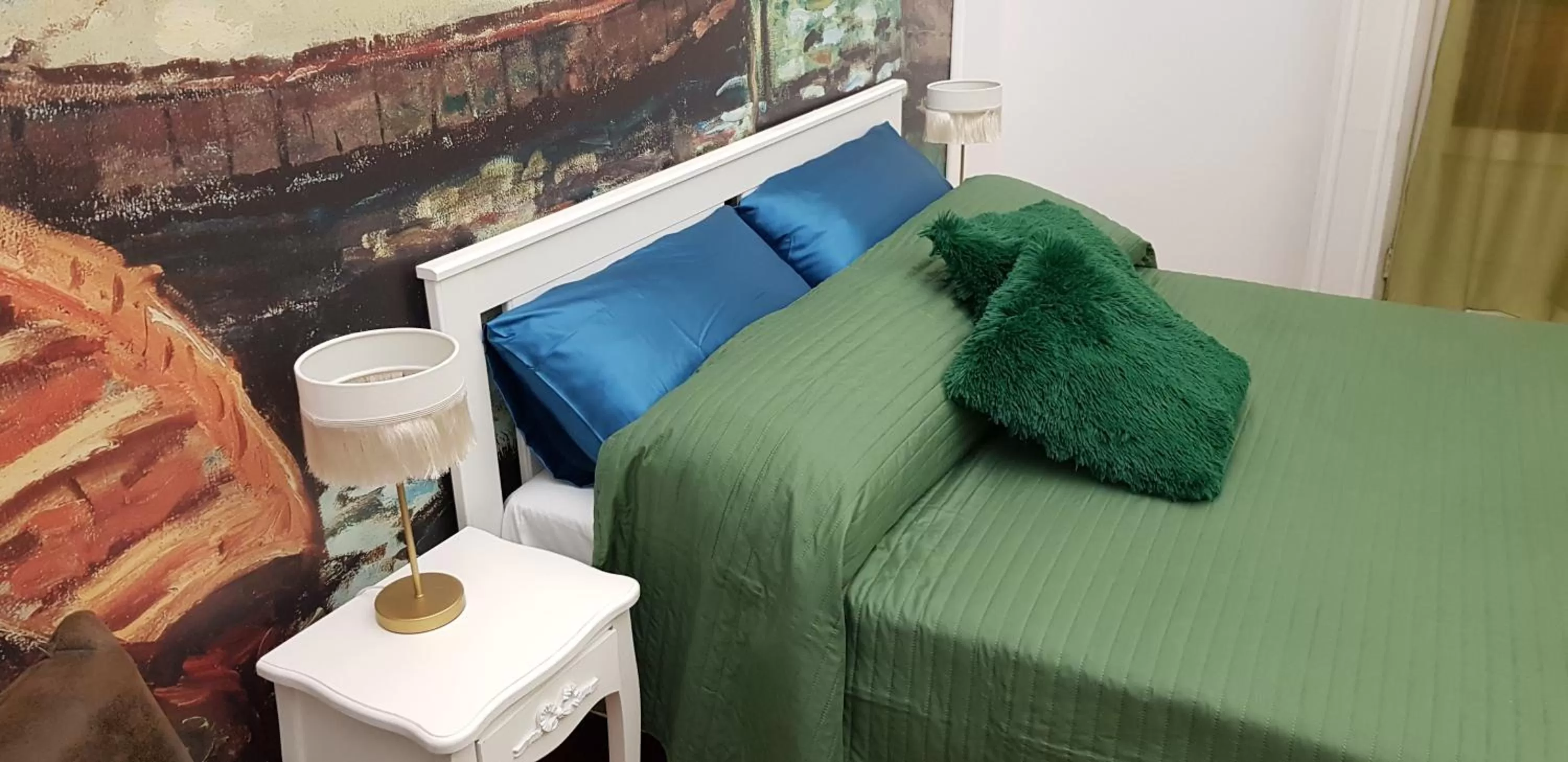 Bed in RarityArt GuestHouse