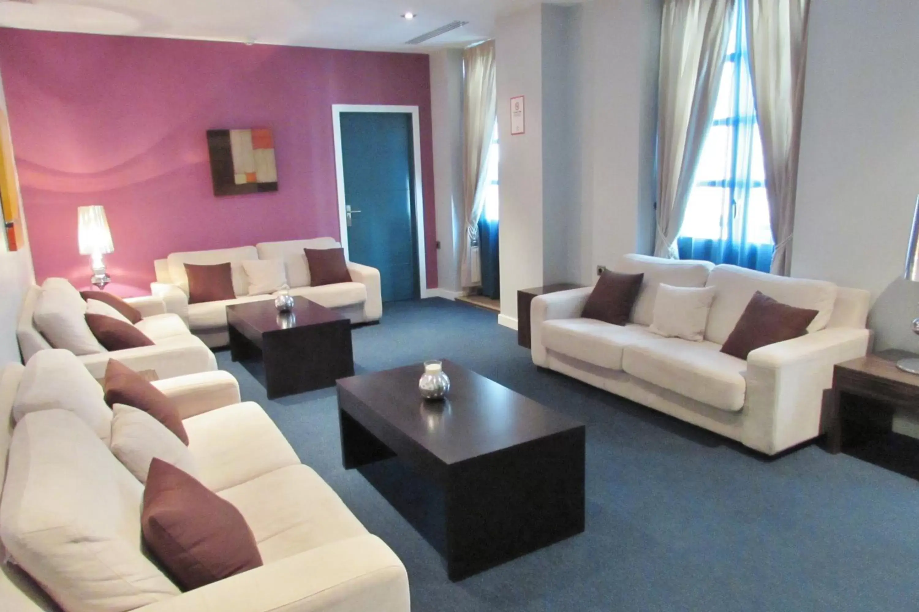 Communal lounge/ TV room, Seating Area in La Casa de la Trinidad